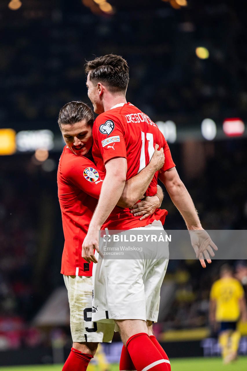 Marcel Sabitzer and Michael Gregoritsch celebrate the 0-1