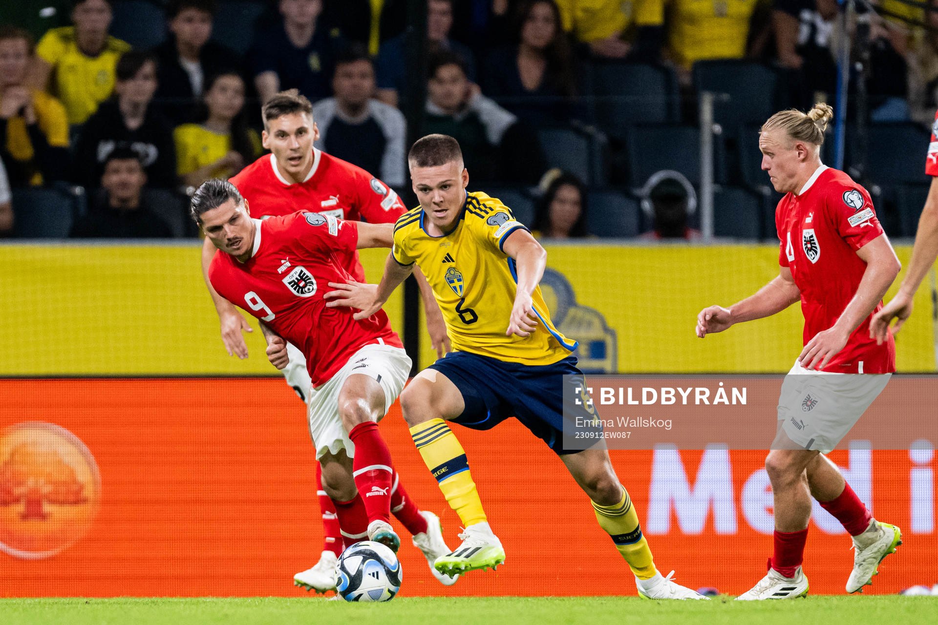 Marcel Sabitzer of Austria and Emil Holm of Sweden