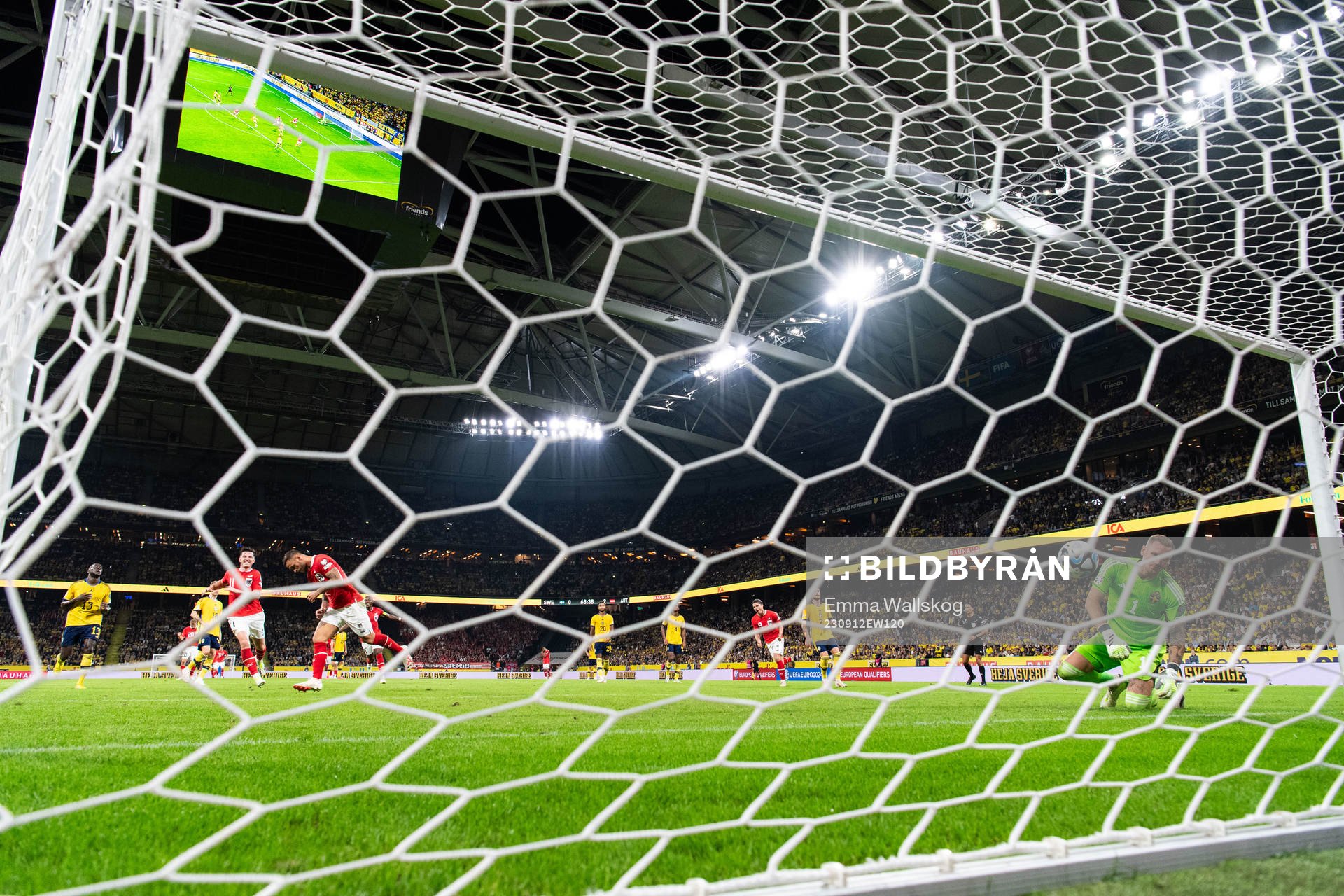 Marko Arnautovic of Austria celebrates and goalkeeper Robin