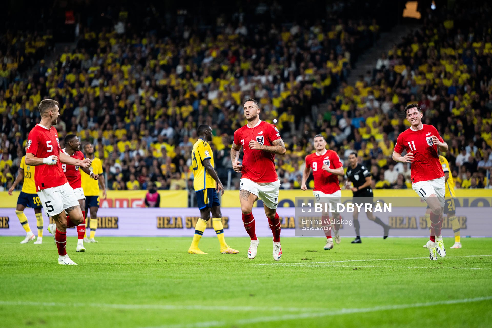 Marko Arnautovic of Austria celebrates with Stefan Posch,
