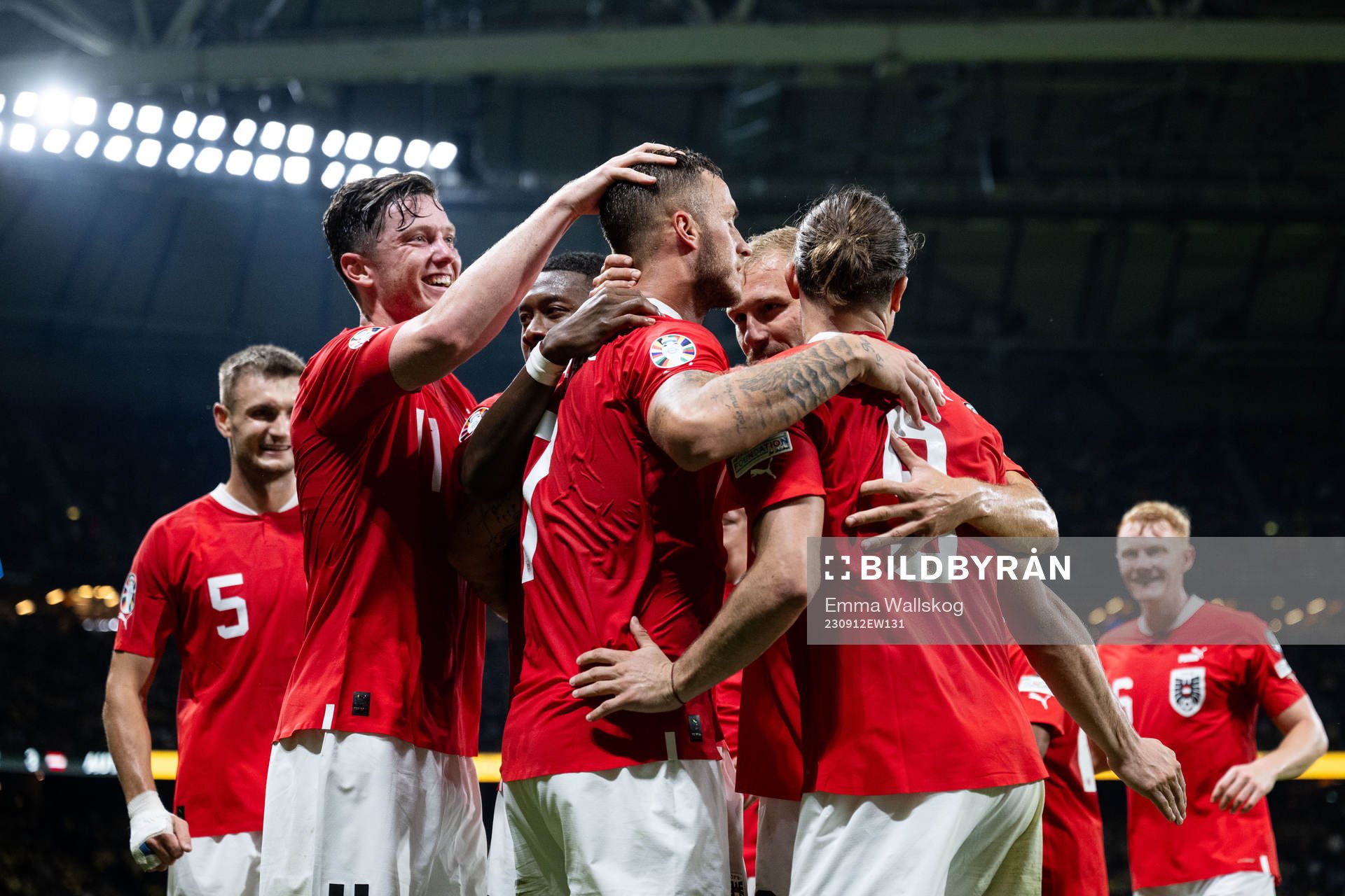 Marko Arnautovic of Austria celebrates with team mates