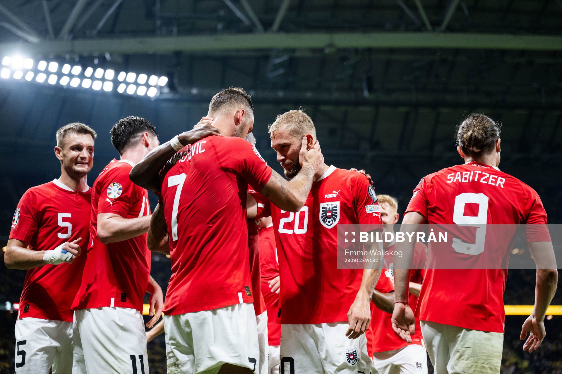 Marko Arnautovic of Austria celebrates with Konrad Laimer