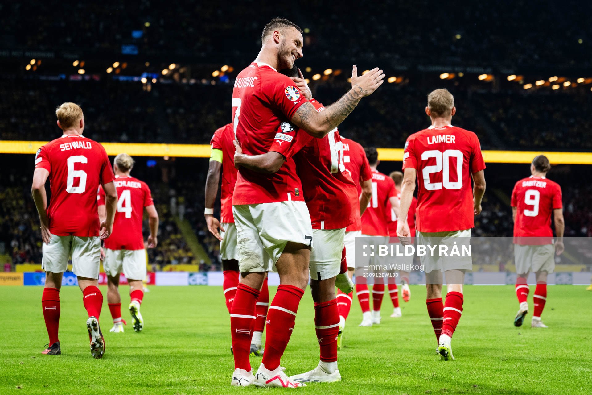 Marko Arnautovic of Austria celebrates with Philip Mwene