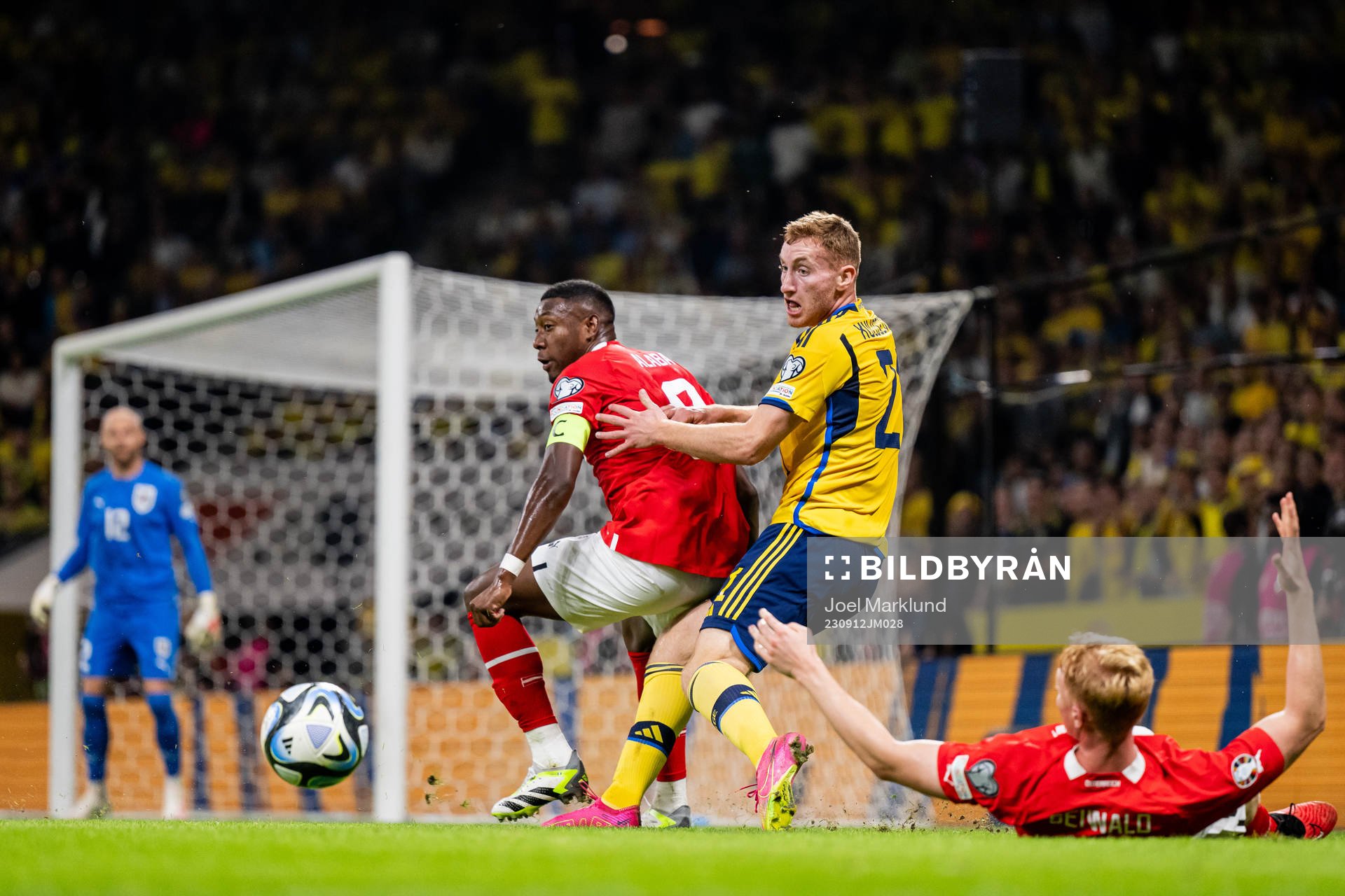 David Alaba of Austria and Dejan Kulusevski of Sweden