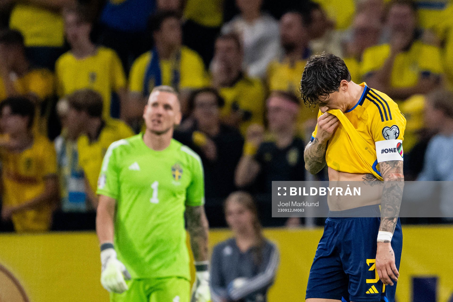 Goalkeeper Robin Olsen and Victor Nilsson Lindelöf of