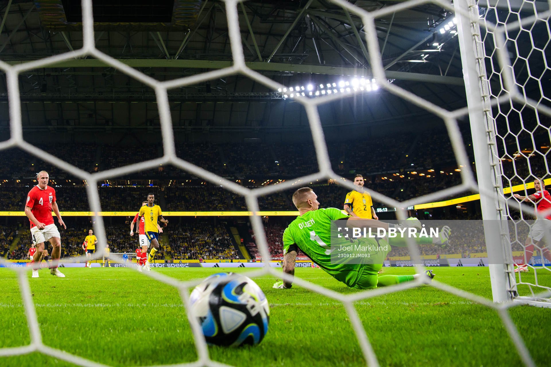 Goalkeeper Robin Olsen of Sweden lets in the 0-2 goal by