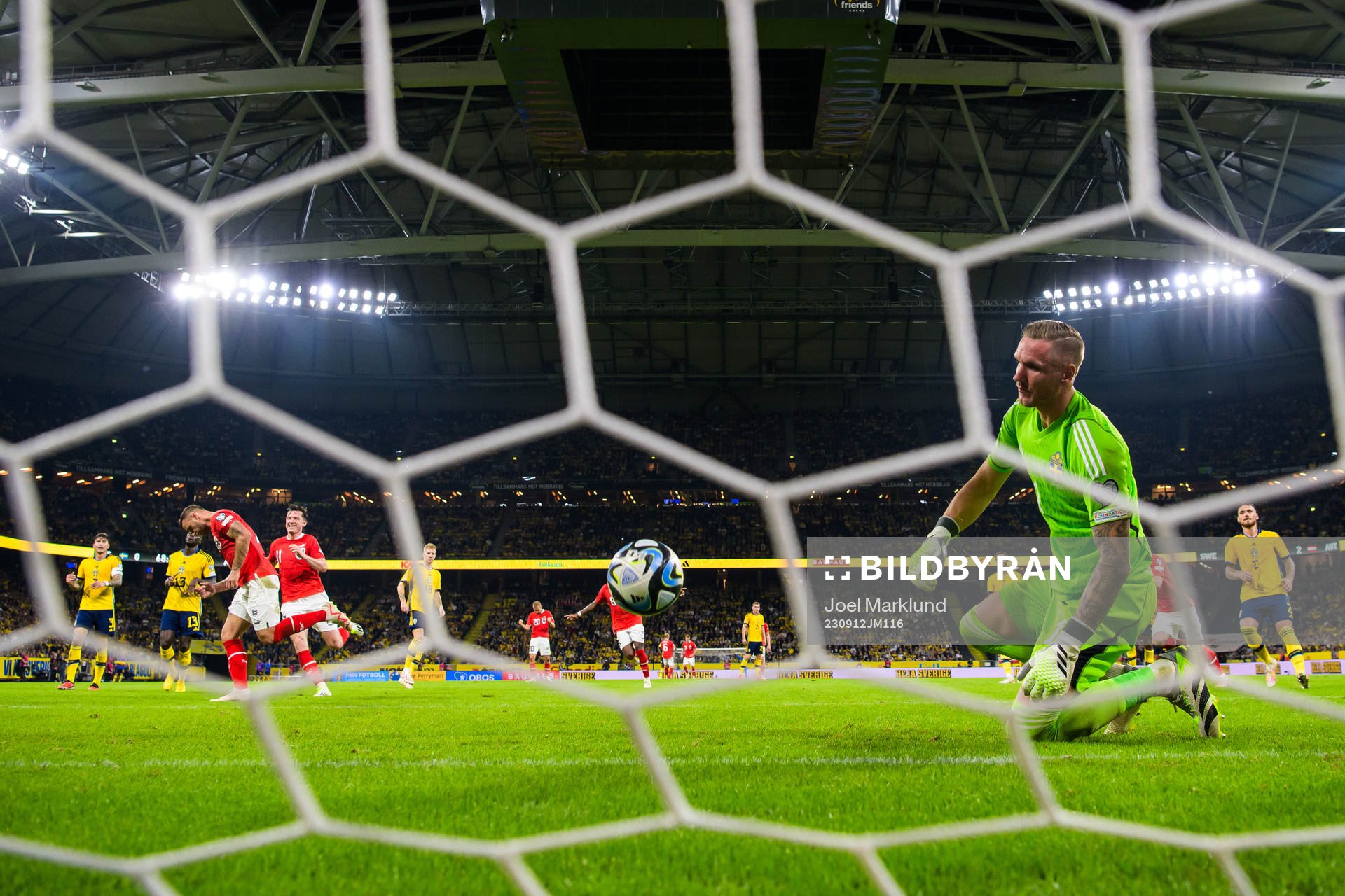Goalkeeper Robin Olsen of Sweden looks dejected when Marko