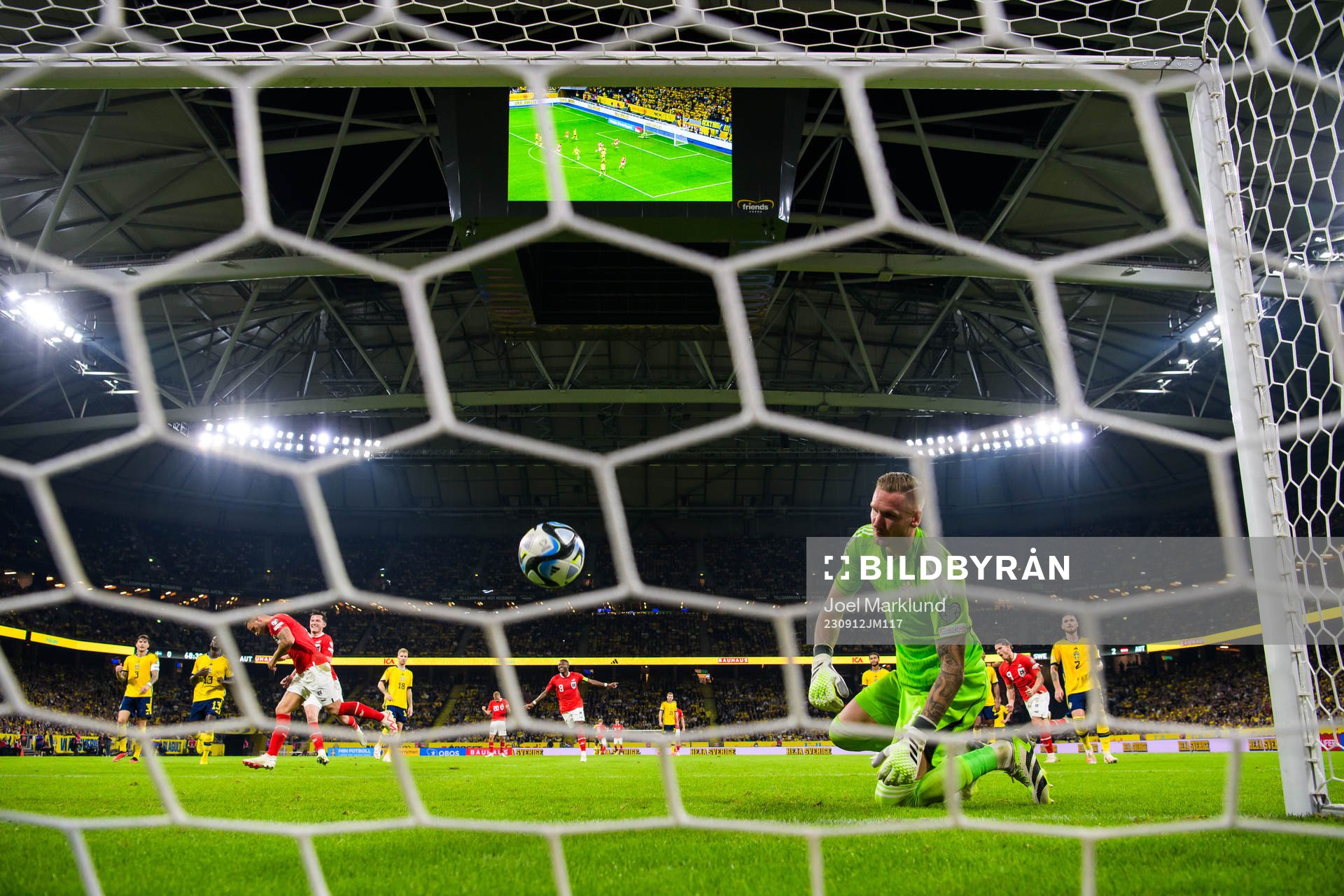 Goalkeeper Robin Olsen of Sweden looks dejected when Marko