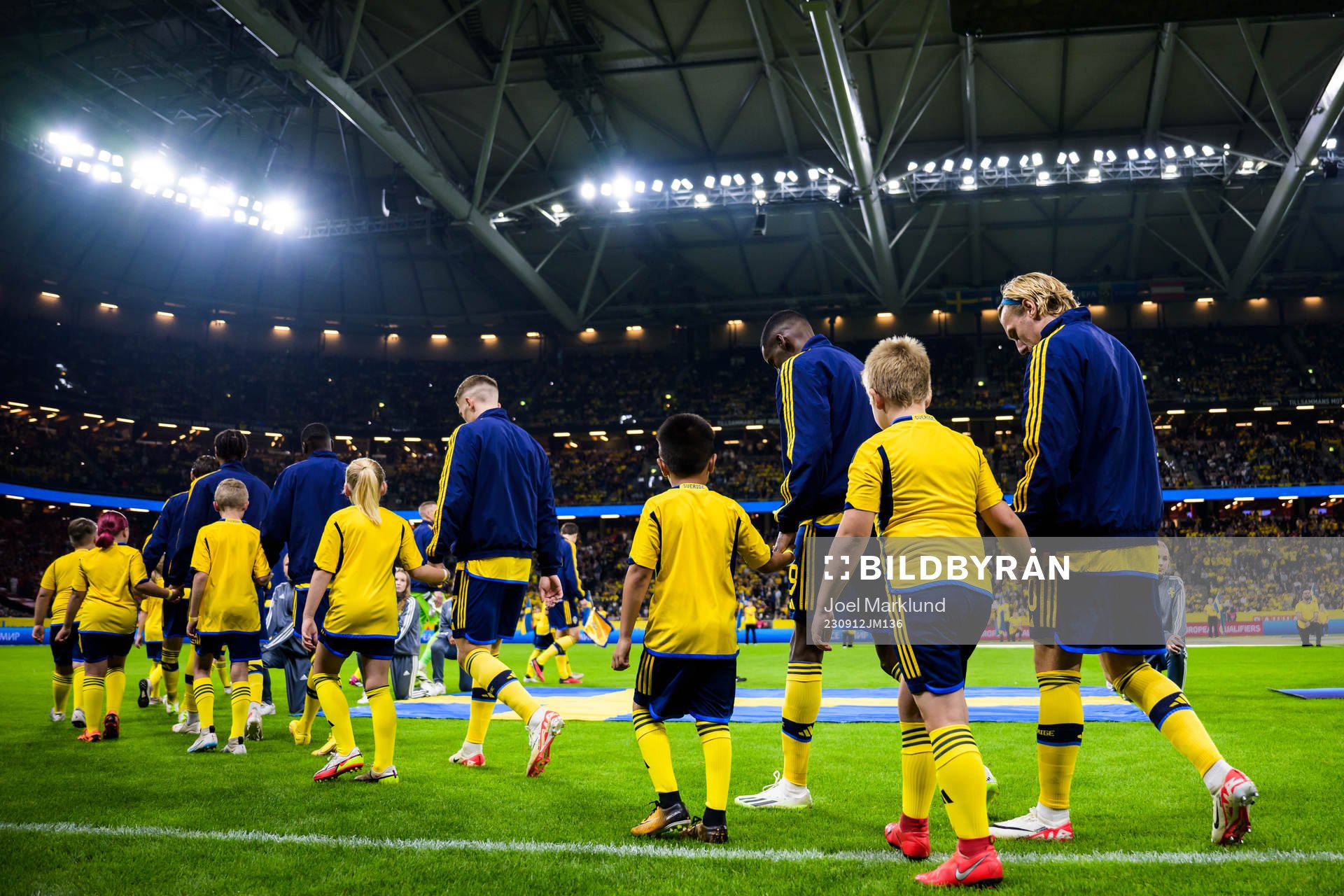 Alexander Isak and Emil Forsberg of Sweden enter the pitch