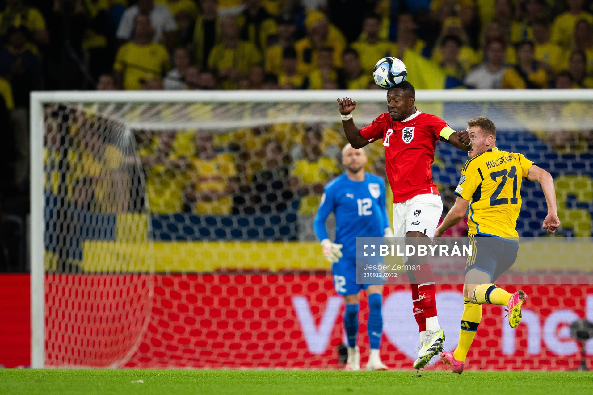 David Alaba of Austria and Dejan Kulusevski of Sweden
