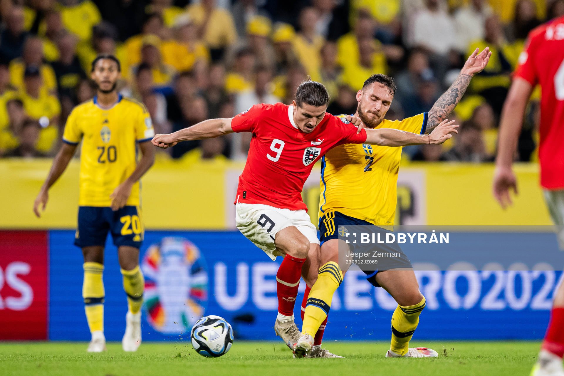 Marcel Sabitzer of Austria and Linus Wahlqvist Egnell of