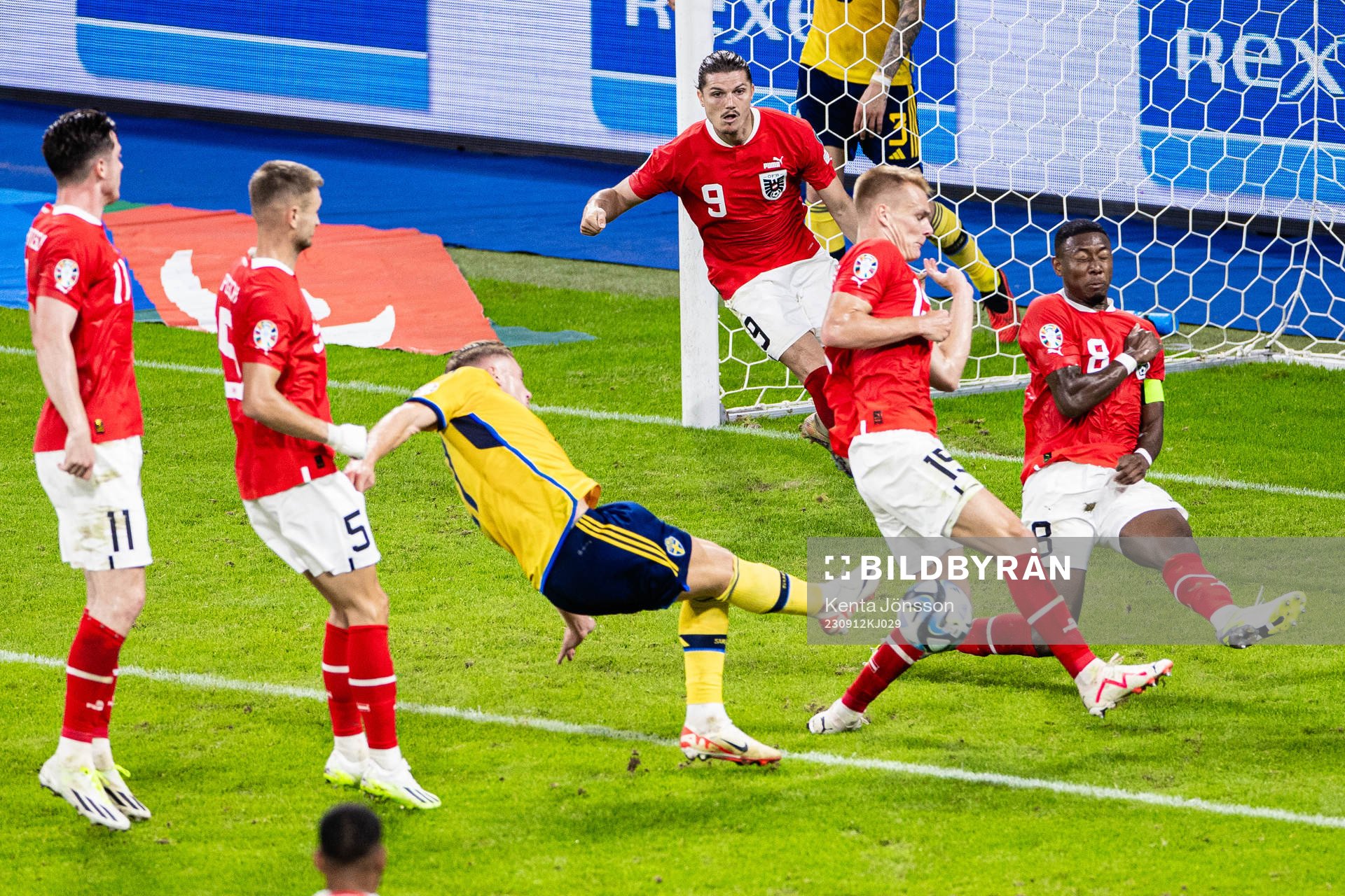 Viktor Gyökeres of Sweden and Philipp Lienhart and David