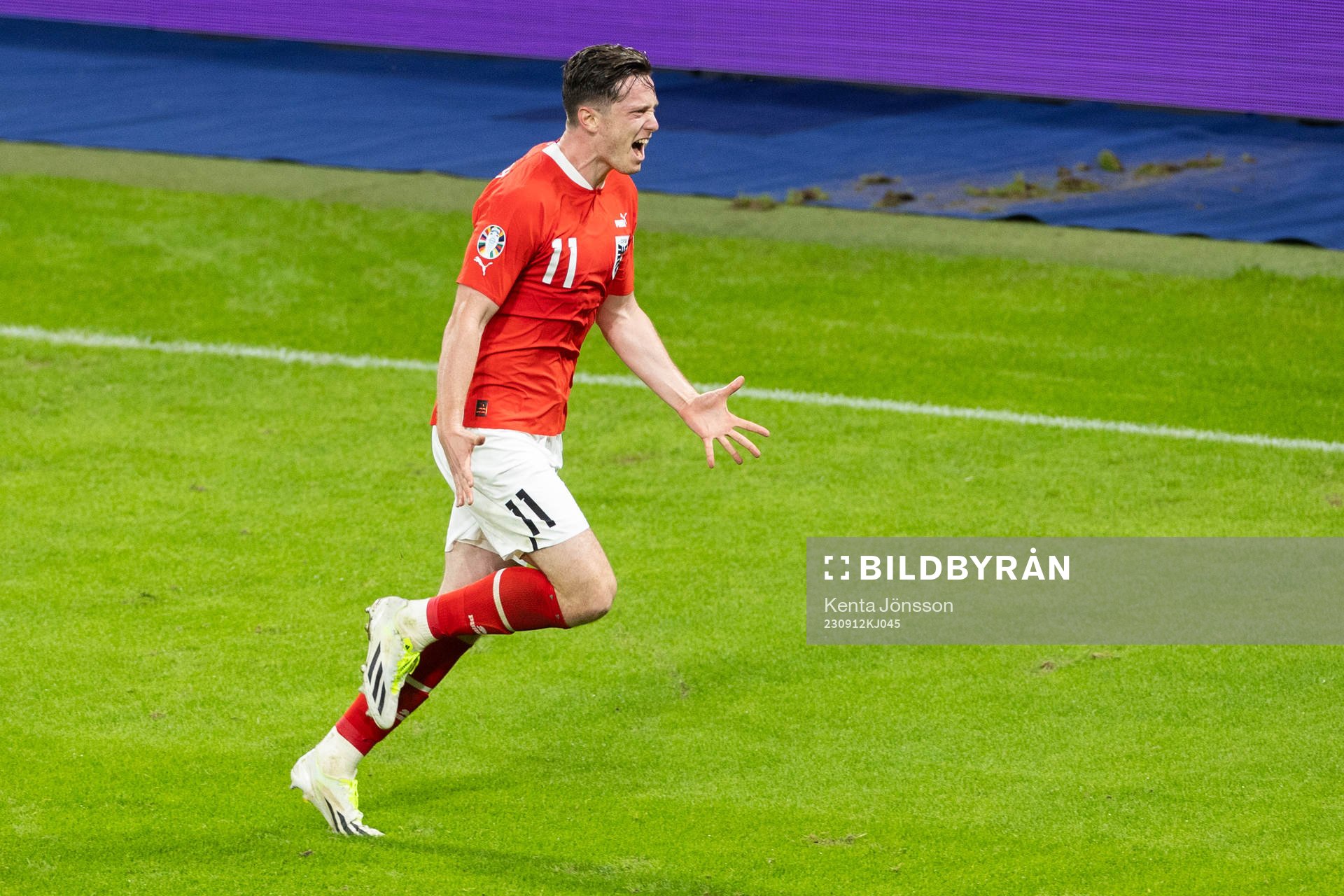 Michael Gregoritsch of Austria celebrates