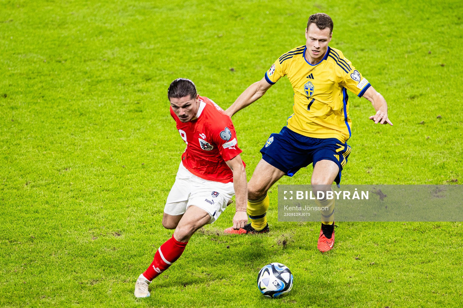 Marcel Sabitzer of Austria and Viktor Claesson of Sweden