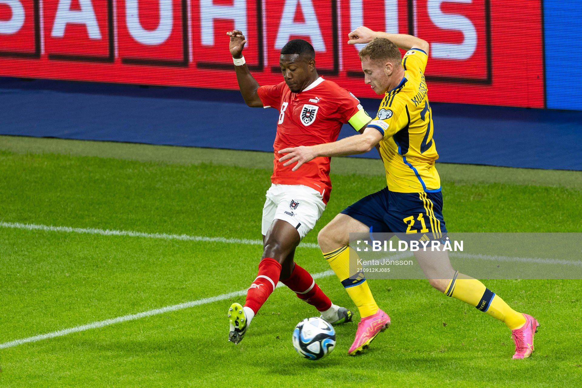 David Alaba of Austria and Dejan Kulusevski of Sweden