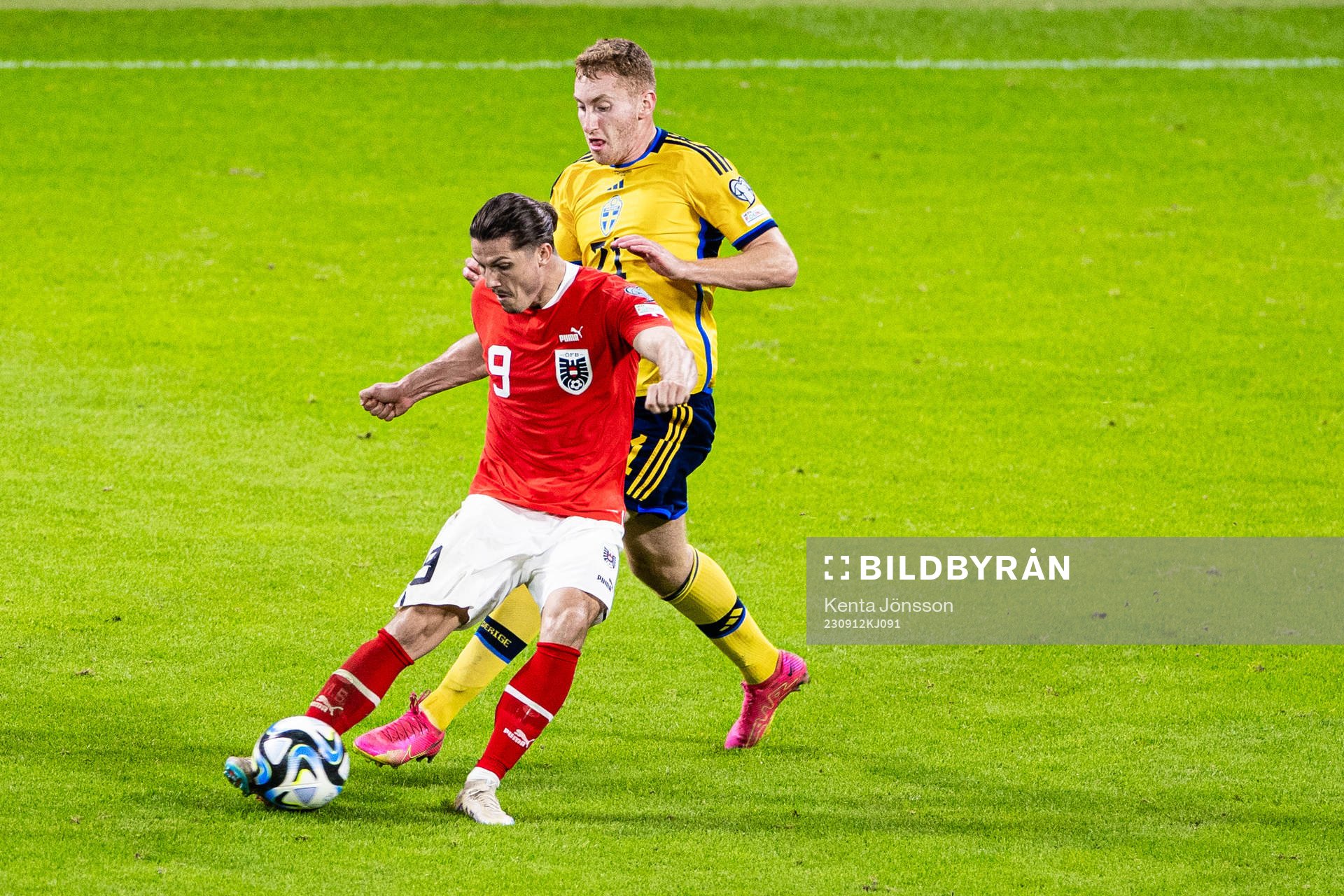Marcel Sabitzer of Austria and Dejan Kulusevski of Sweden