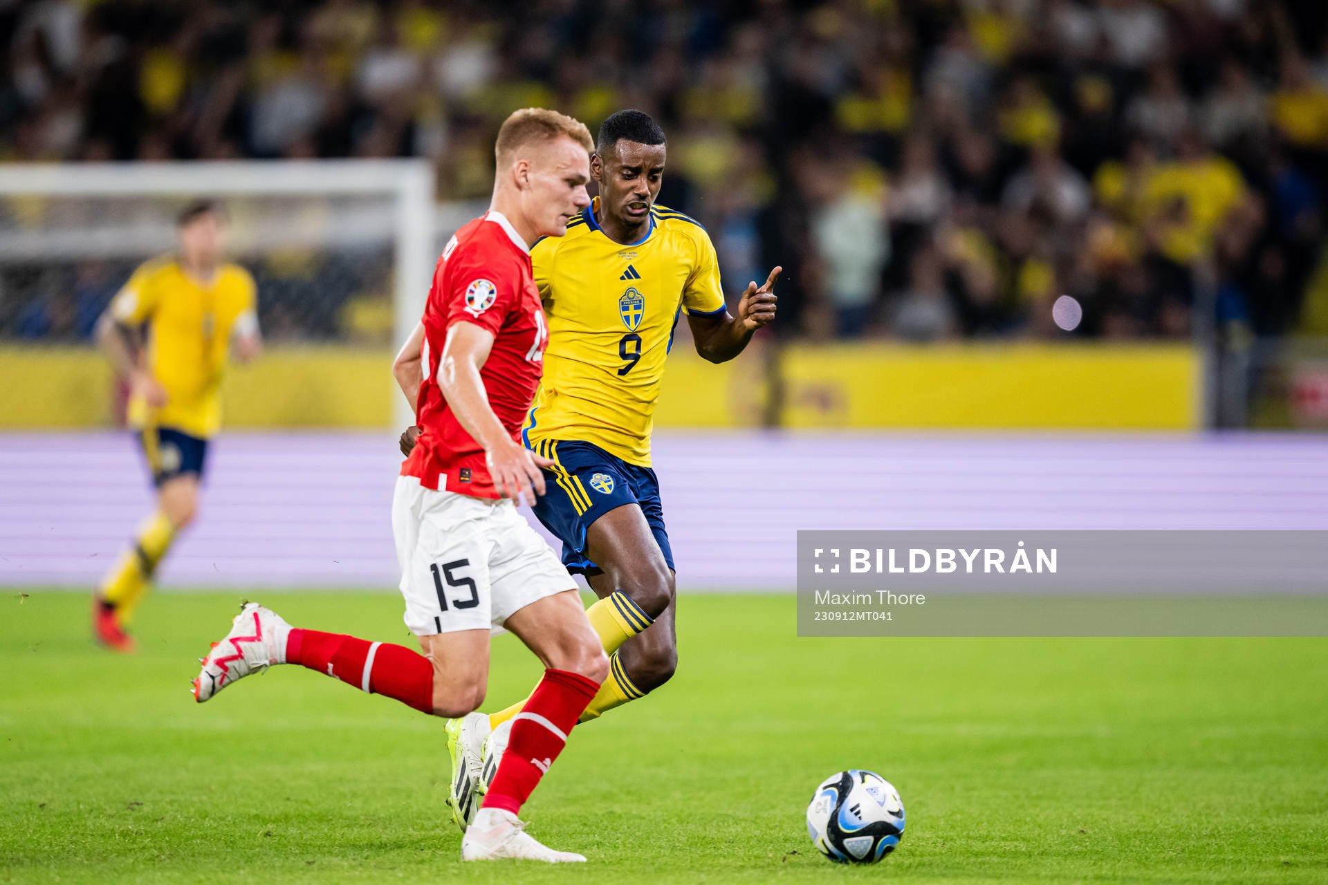 Philipp Lienhart of Austria and Alexander Isak of Sweden