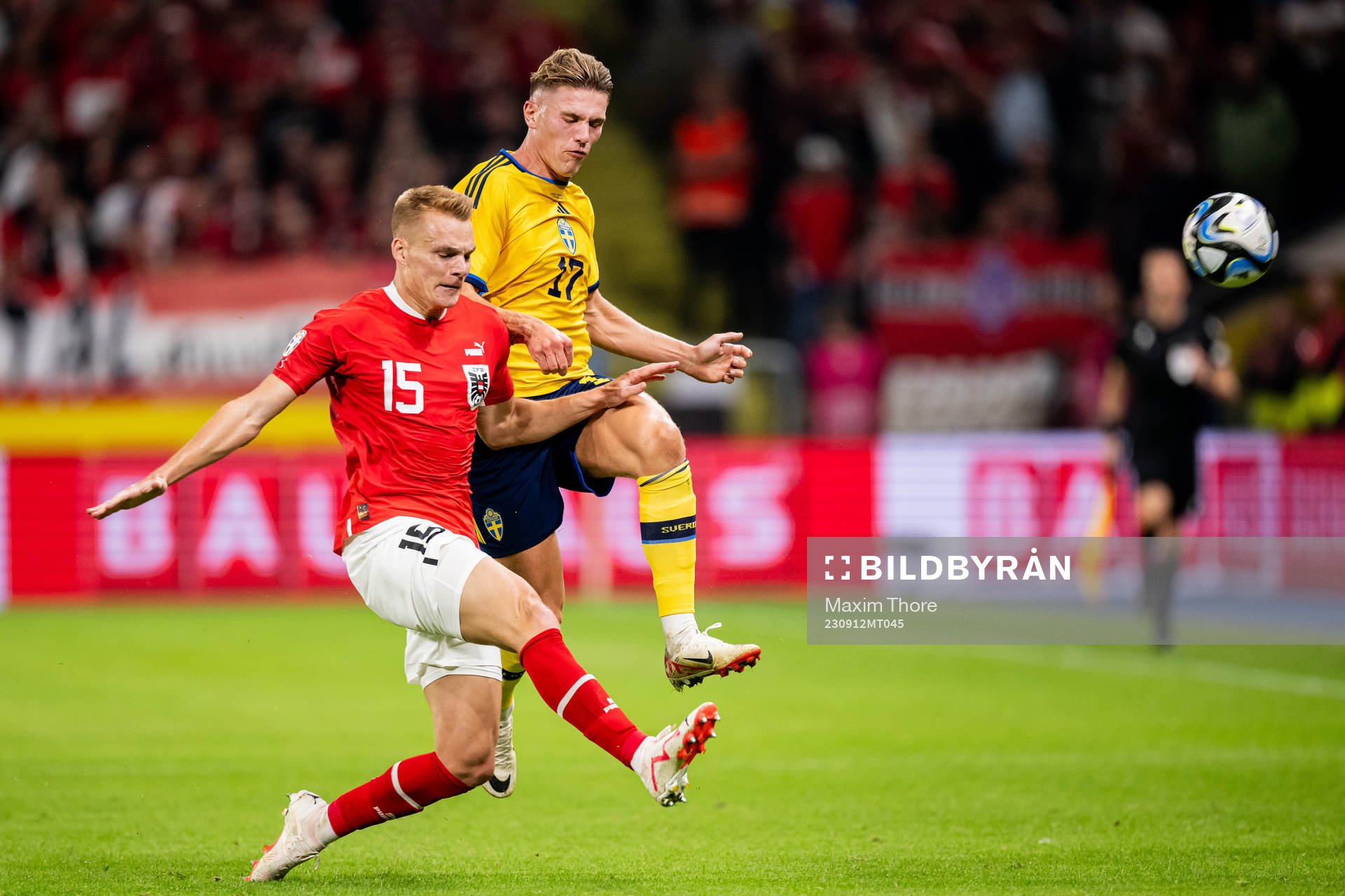 Philipp Lienhart of Austria and Viktor Gyökeres of Sweden