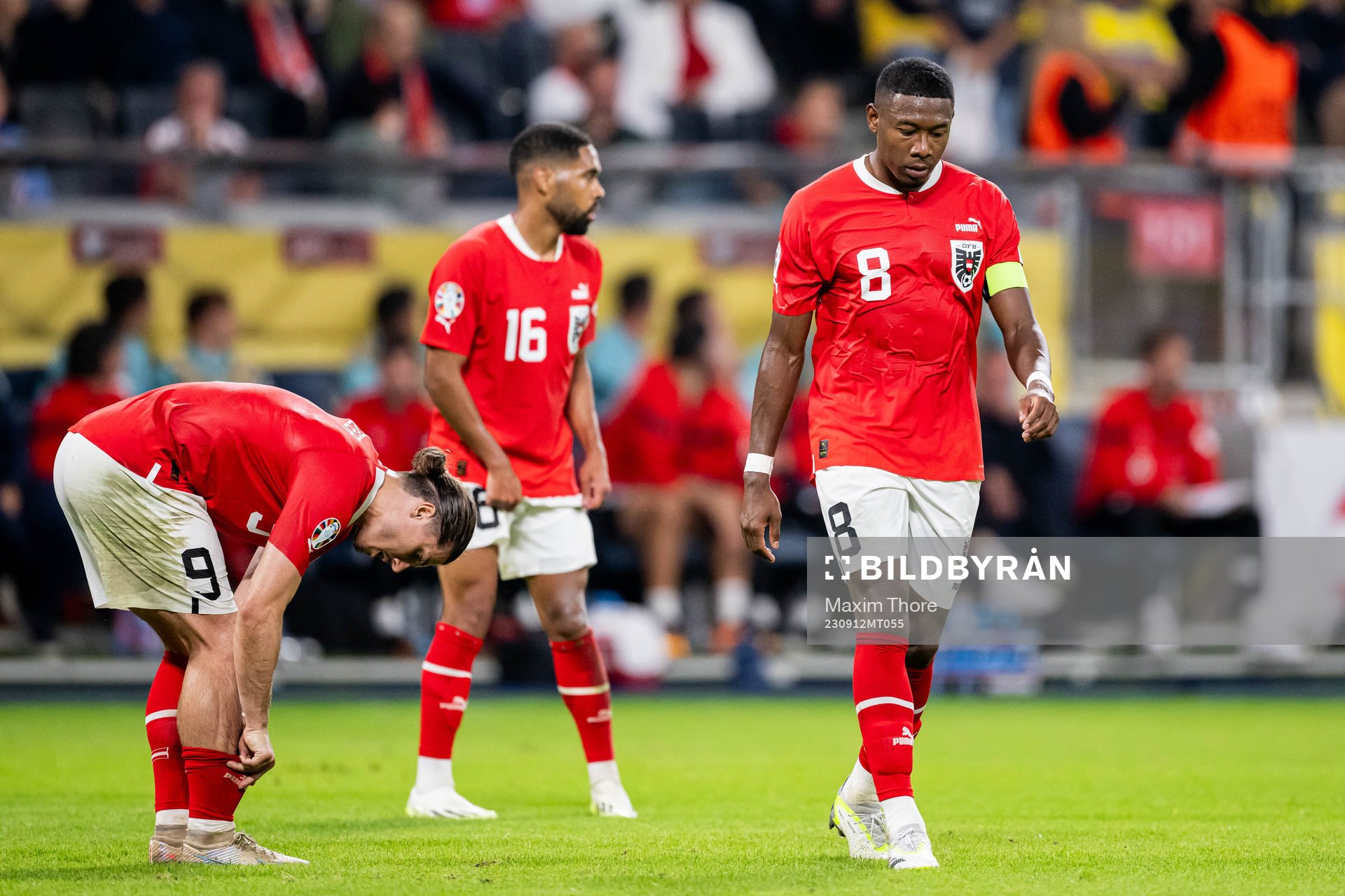 David Alaba of Austria looks dejected