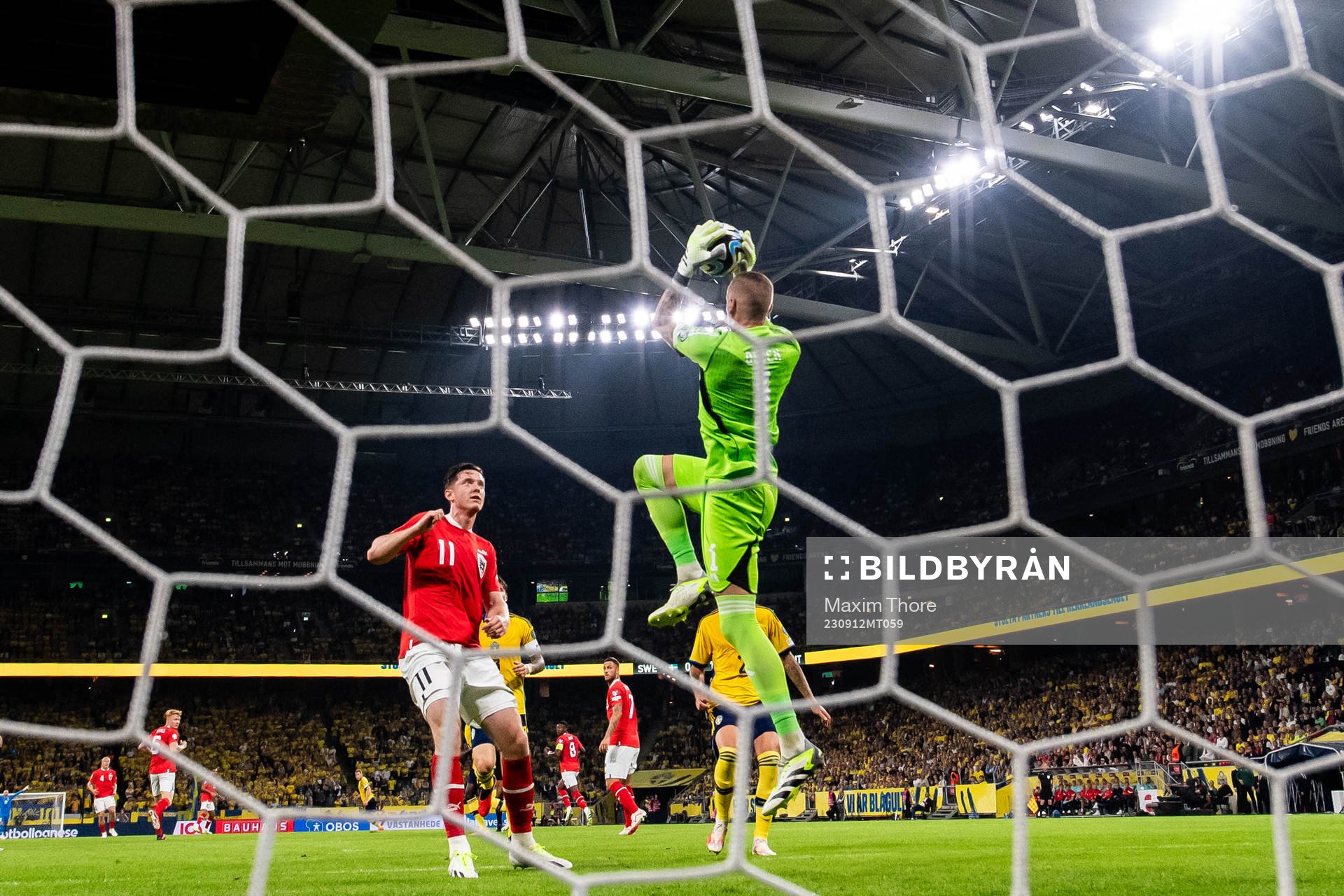 Michael Gregoritsch of Austria and goalkeeper Robin Olsen