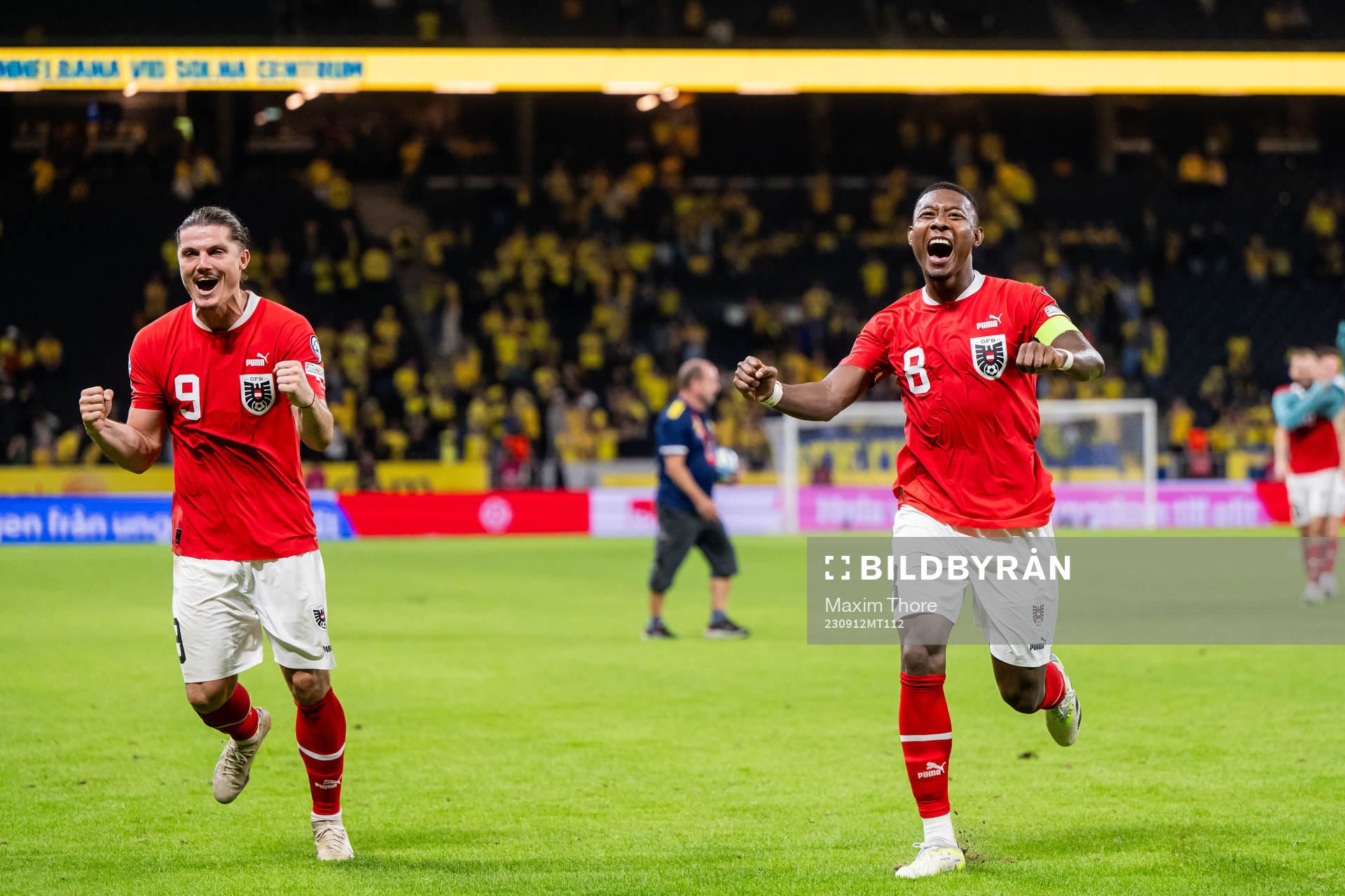 Marcel Sabitzer and David Alaba of Austria celebrate after the UEFA Euro Qualifier football match between Sweden and Austria on September 12, 2023 in Stockholm.