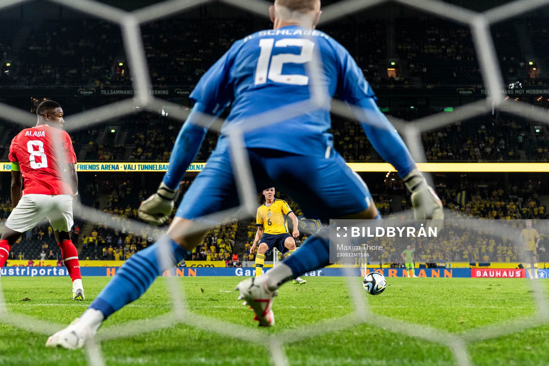 Emil Holm of Sweden scores the 1-3 goal behind David Alaba