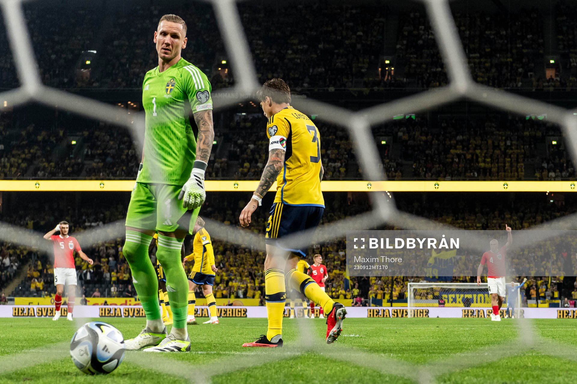 Goalkeeper Robin Olsen and Victor Nilsson Lindelöf of