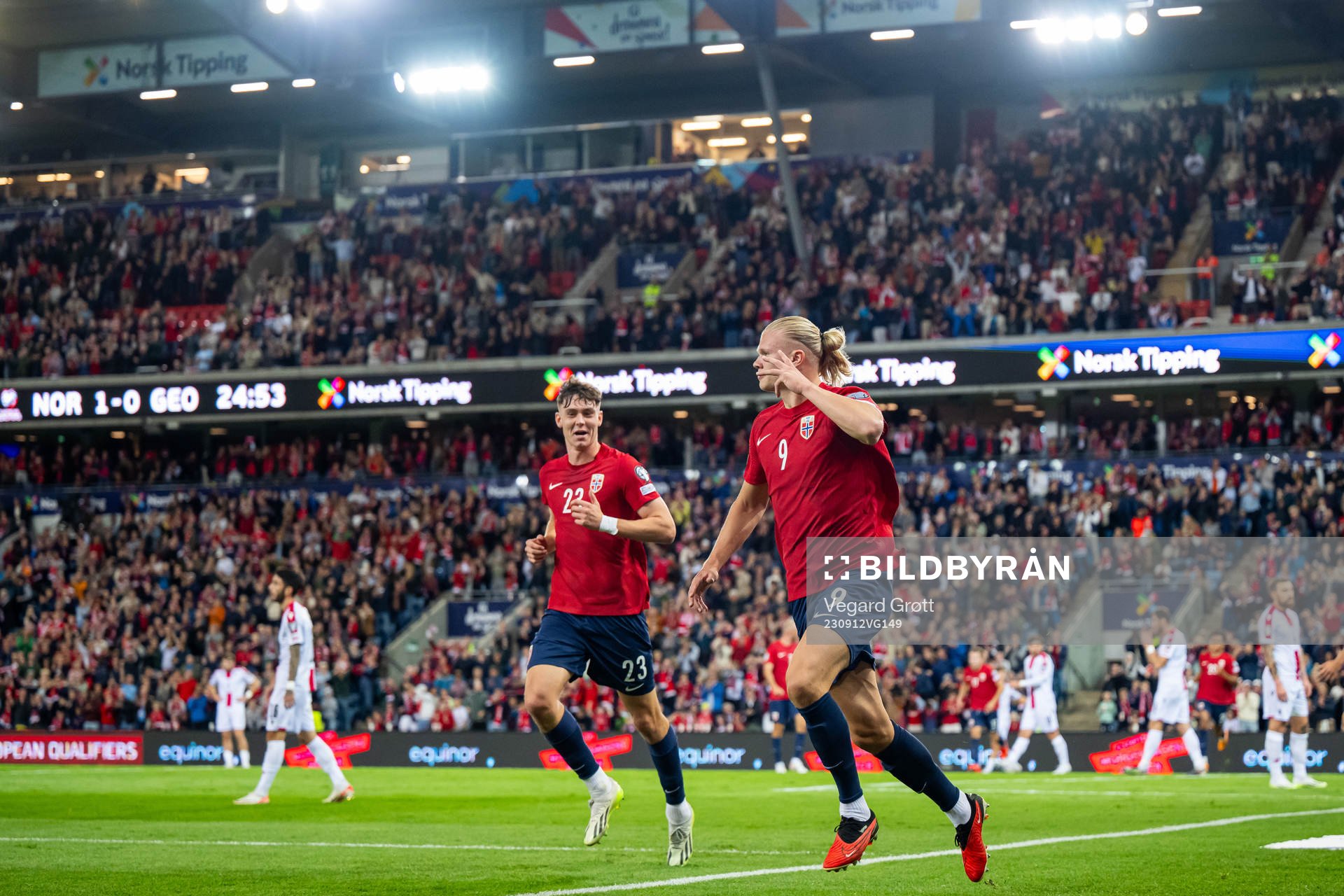 Erling Braut Haaland of Norway celebrates with teammate