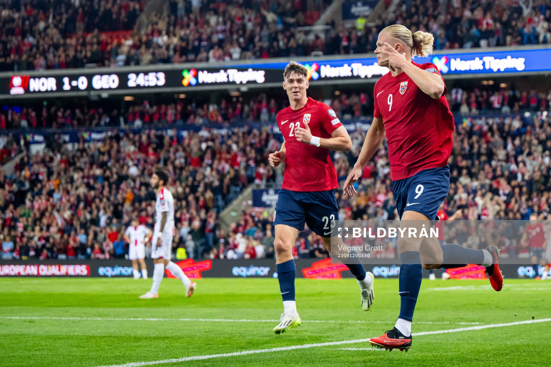 Erling Braut Haaland of Norway celebrates with teammate