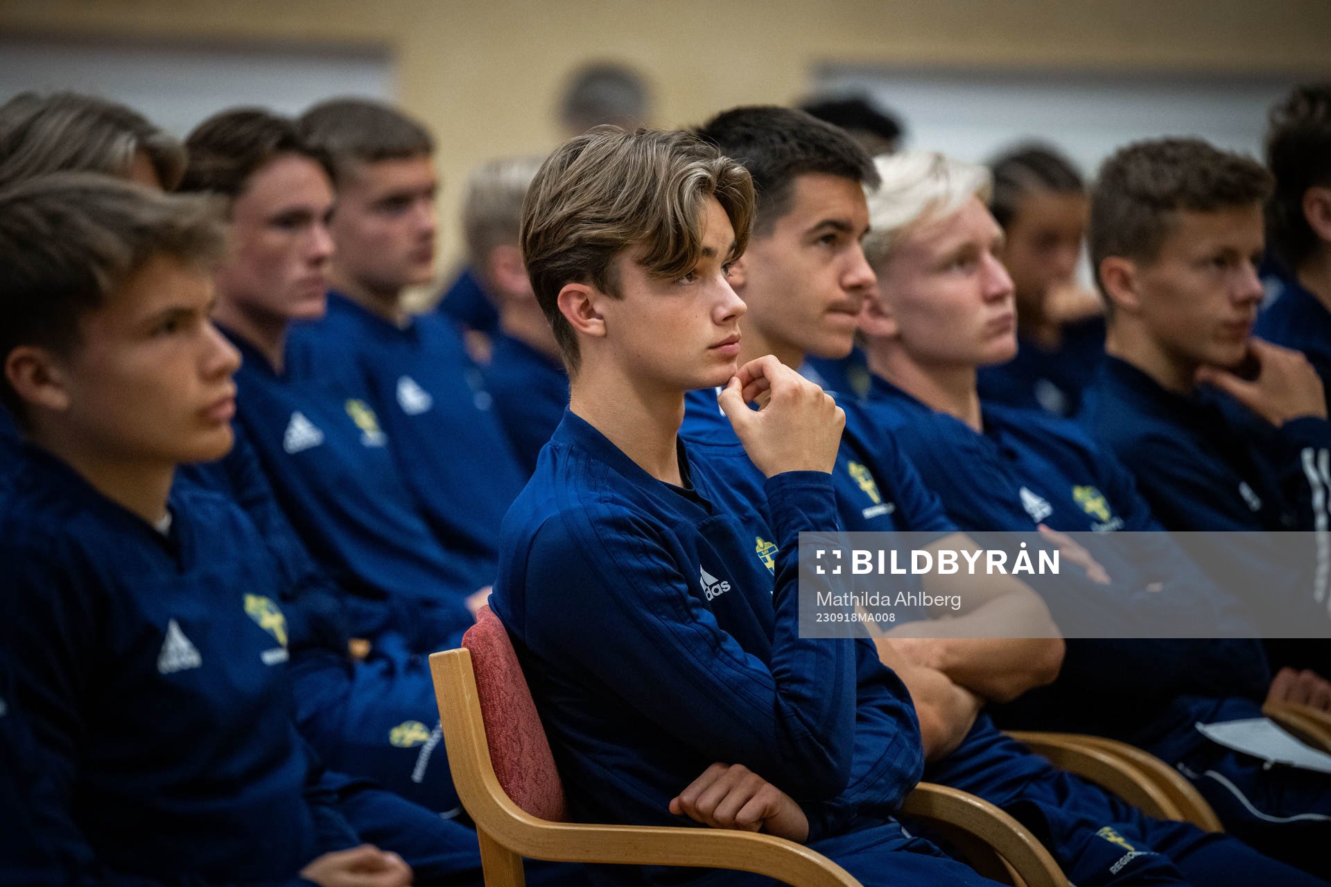 Spelare lyssnar på en teorilektion