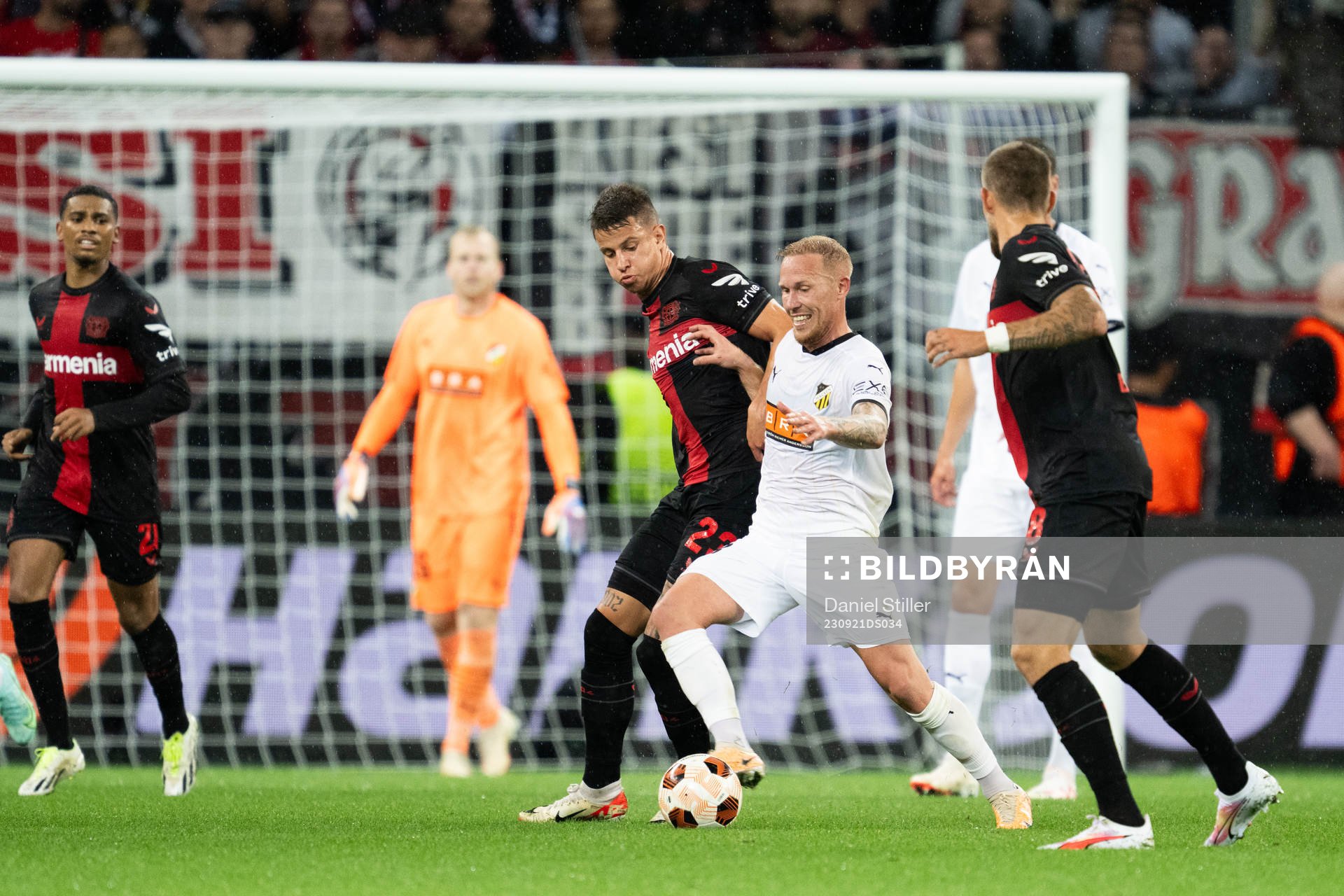 Adam Hložek of Bayer Leverkusen and Mikkel Rygaard Jensen