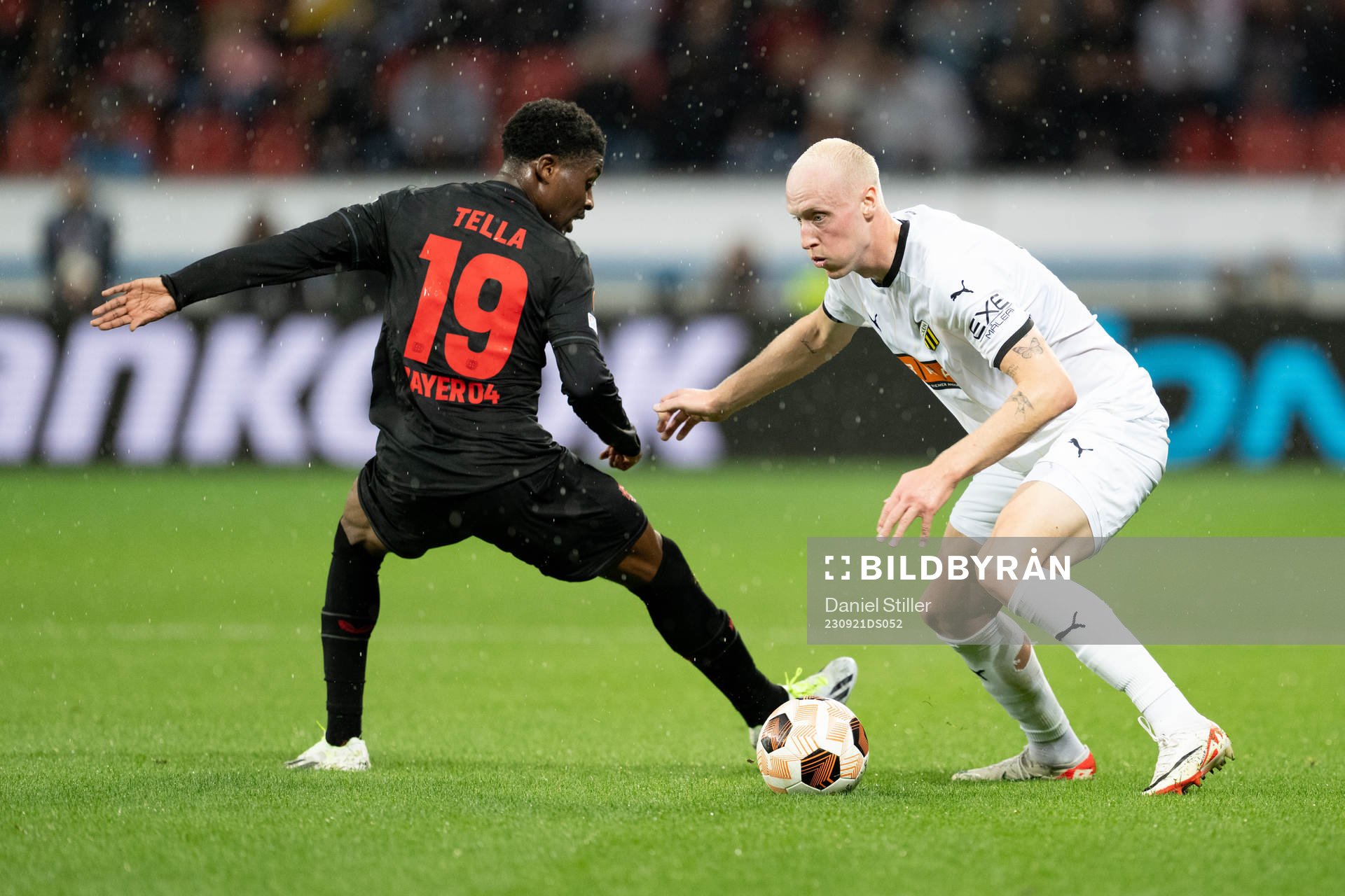 Nathan Tella of Bayer Leverkusen and Valgeir Lunddal of