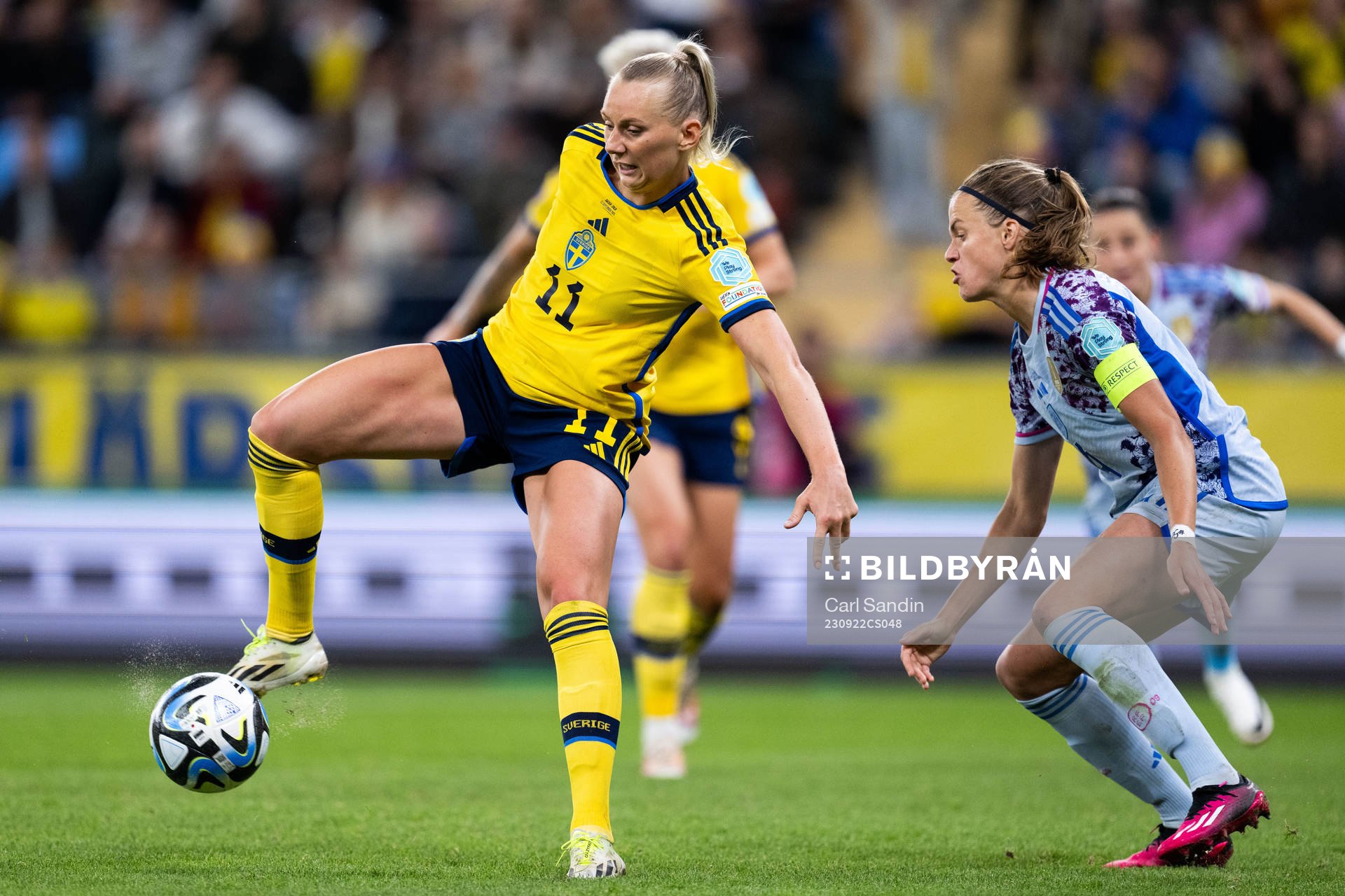 Stina Blackstenius of Sweden and Irene Paredes of Spain