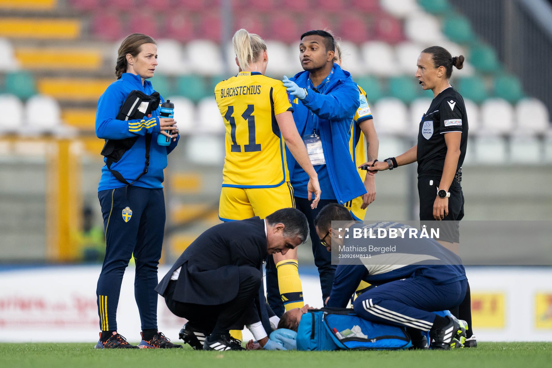 Stina Blackstenius of Sweden in pain and being taken care