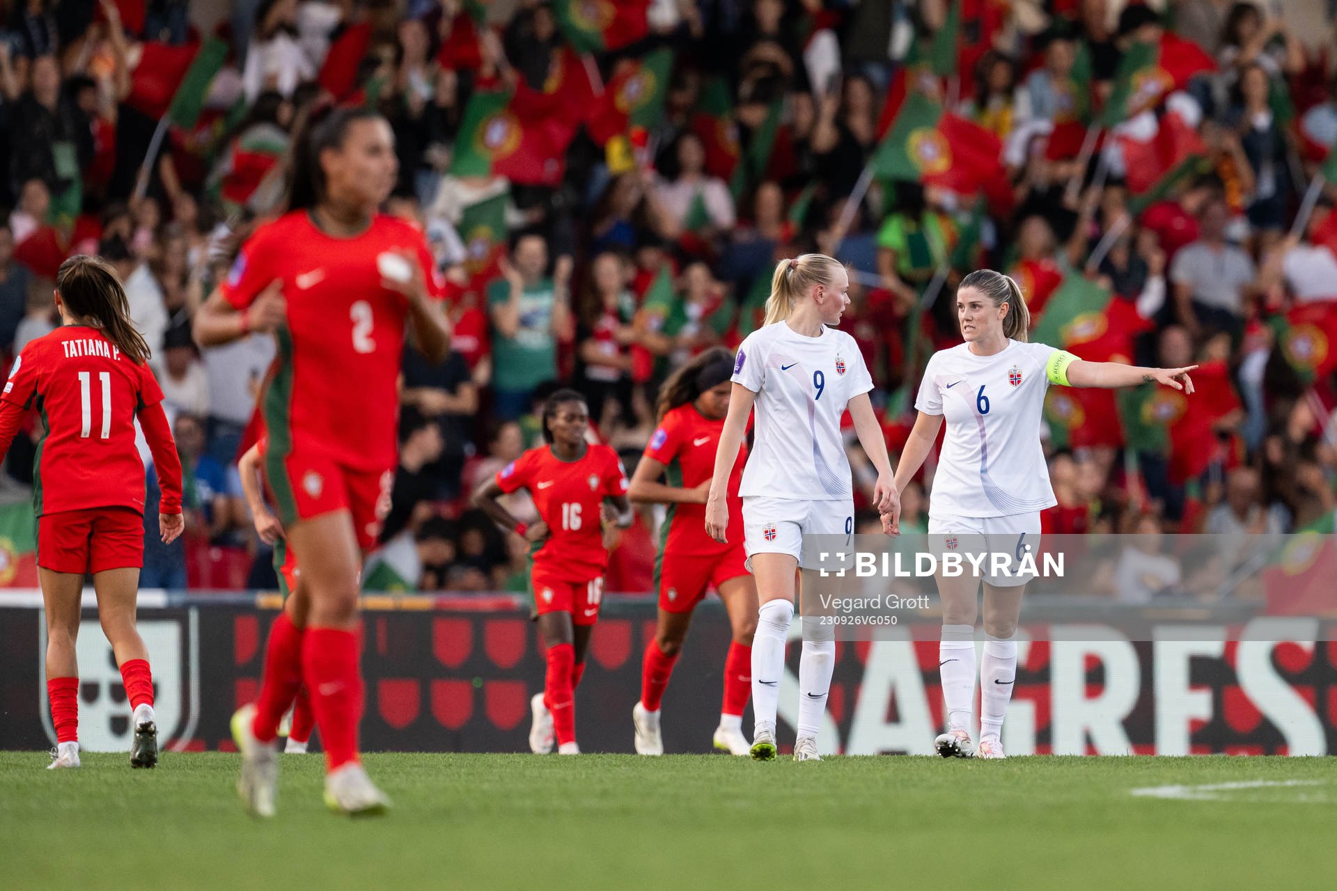 Karina Sævik and Maren Mjelde of Norway look dejected