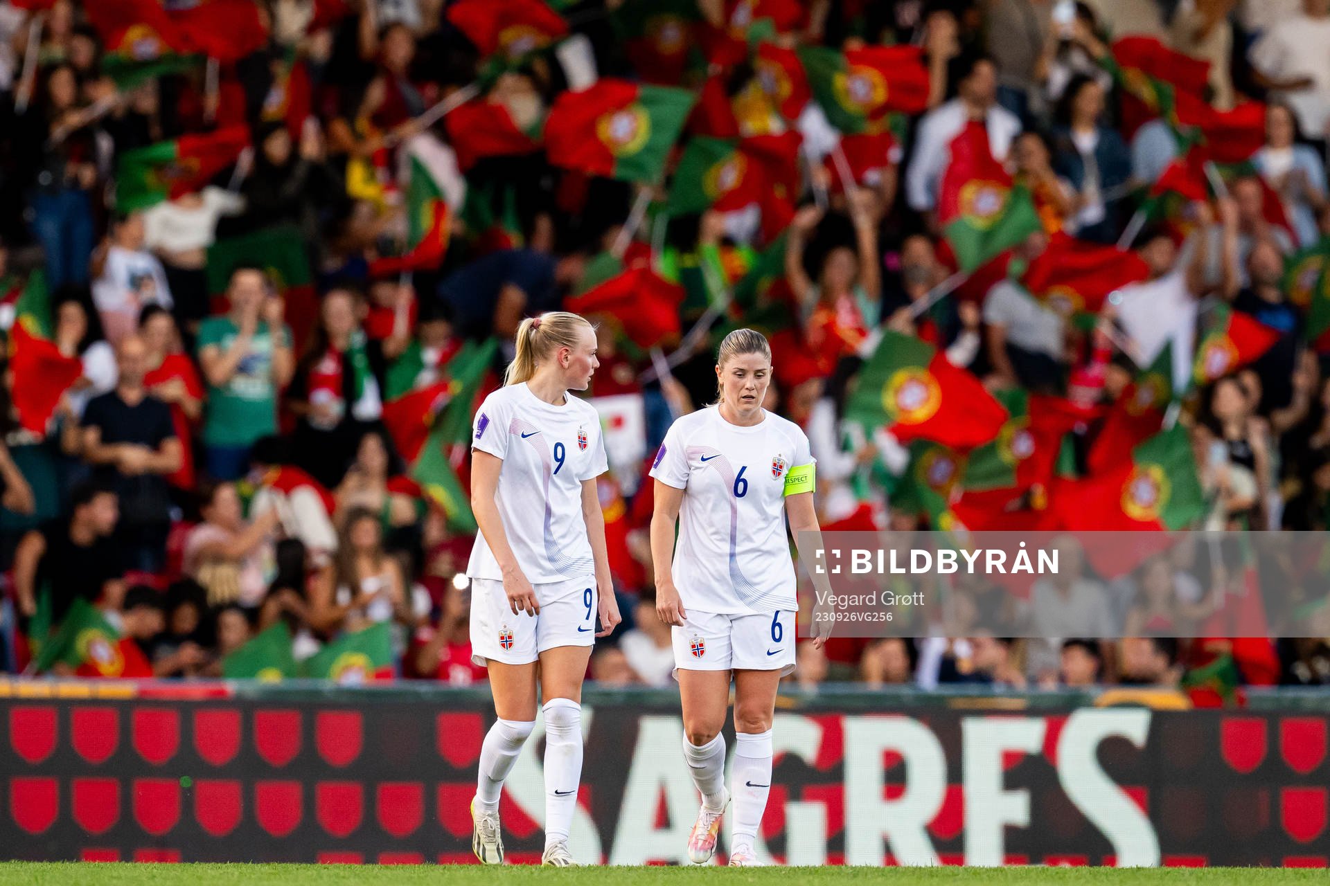 Karina Sævik and Maren Mjelde of Norway look dejected