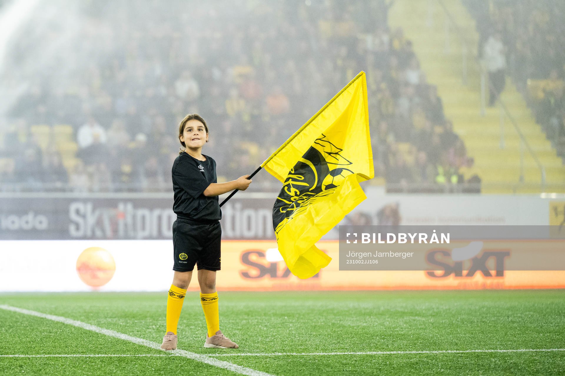 Flaggbärare med Elfsborgs flagga