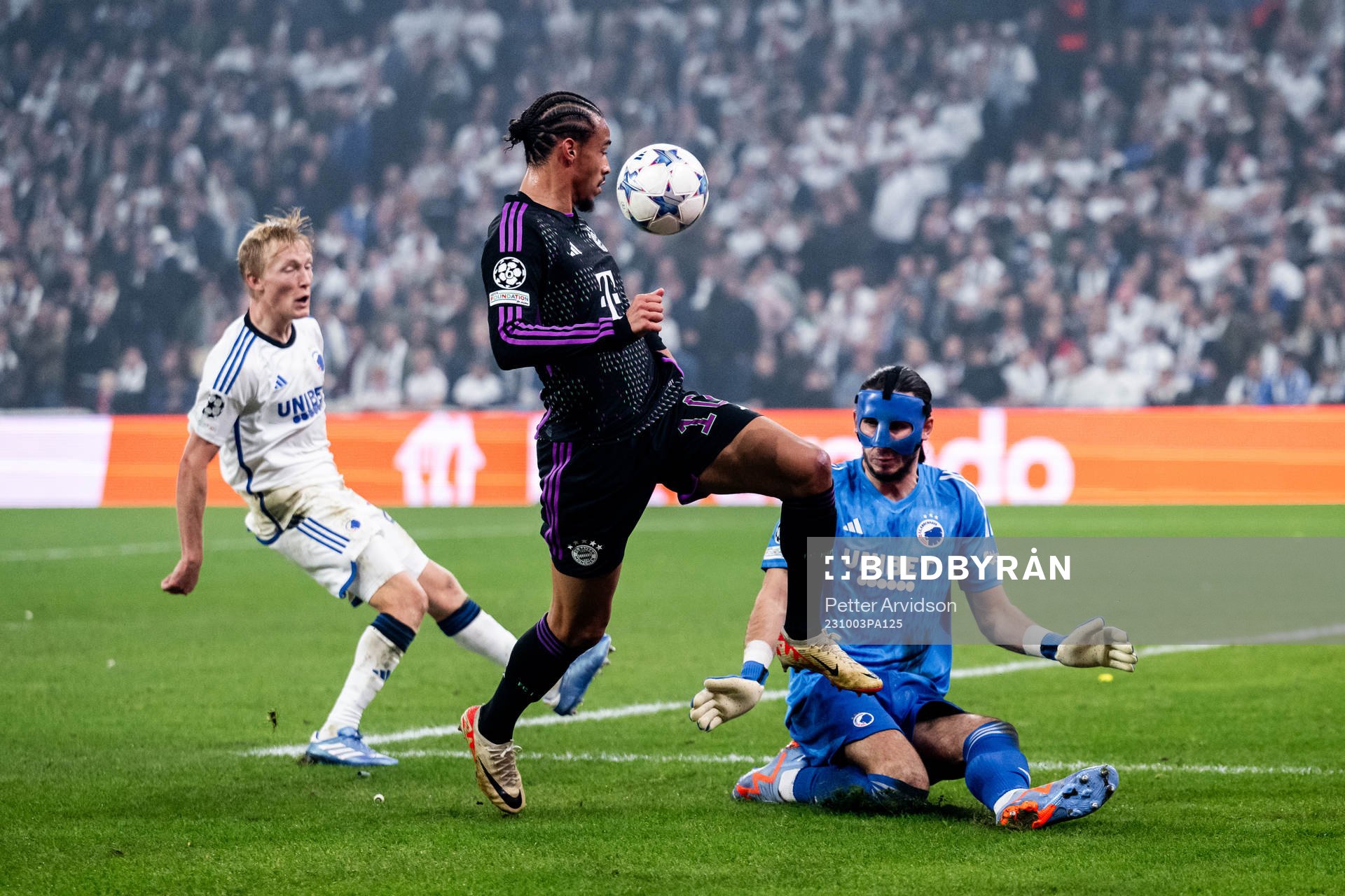 Leroy Sané of Bayern Munich  and goalkeeper Kamil Grabara