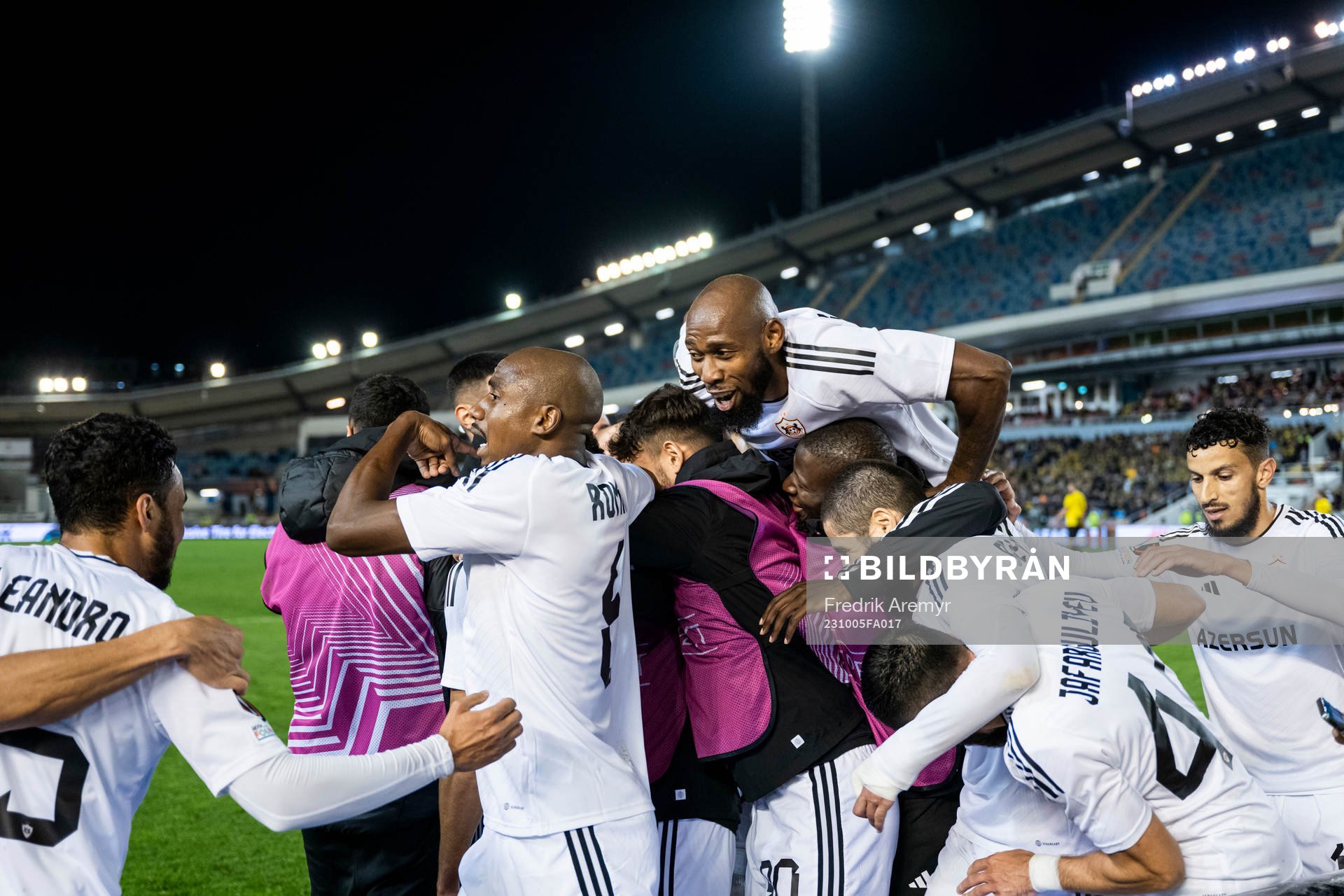 Juninho of Qarabag celebrate with teammates
