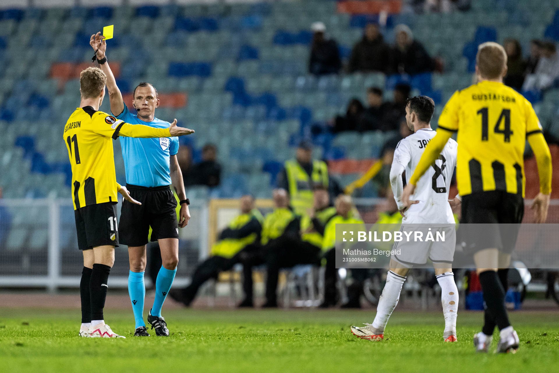 Samuel Gustafson of Häcken receives a warning from referee