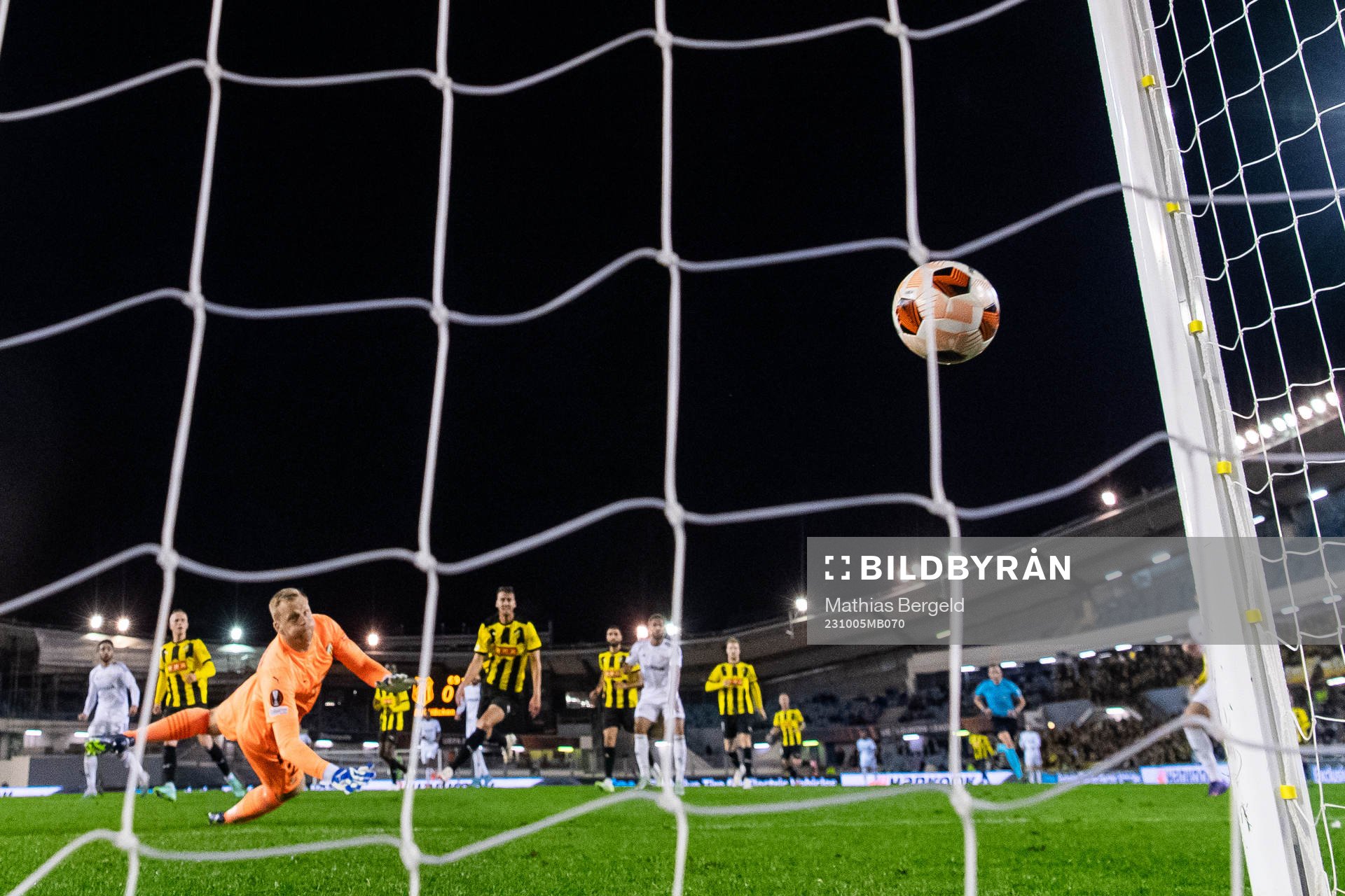 Juninho of Qarabag scores 0-1 behind goalkeeper Peter
