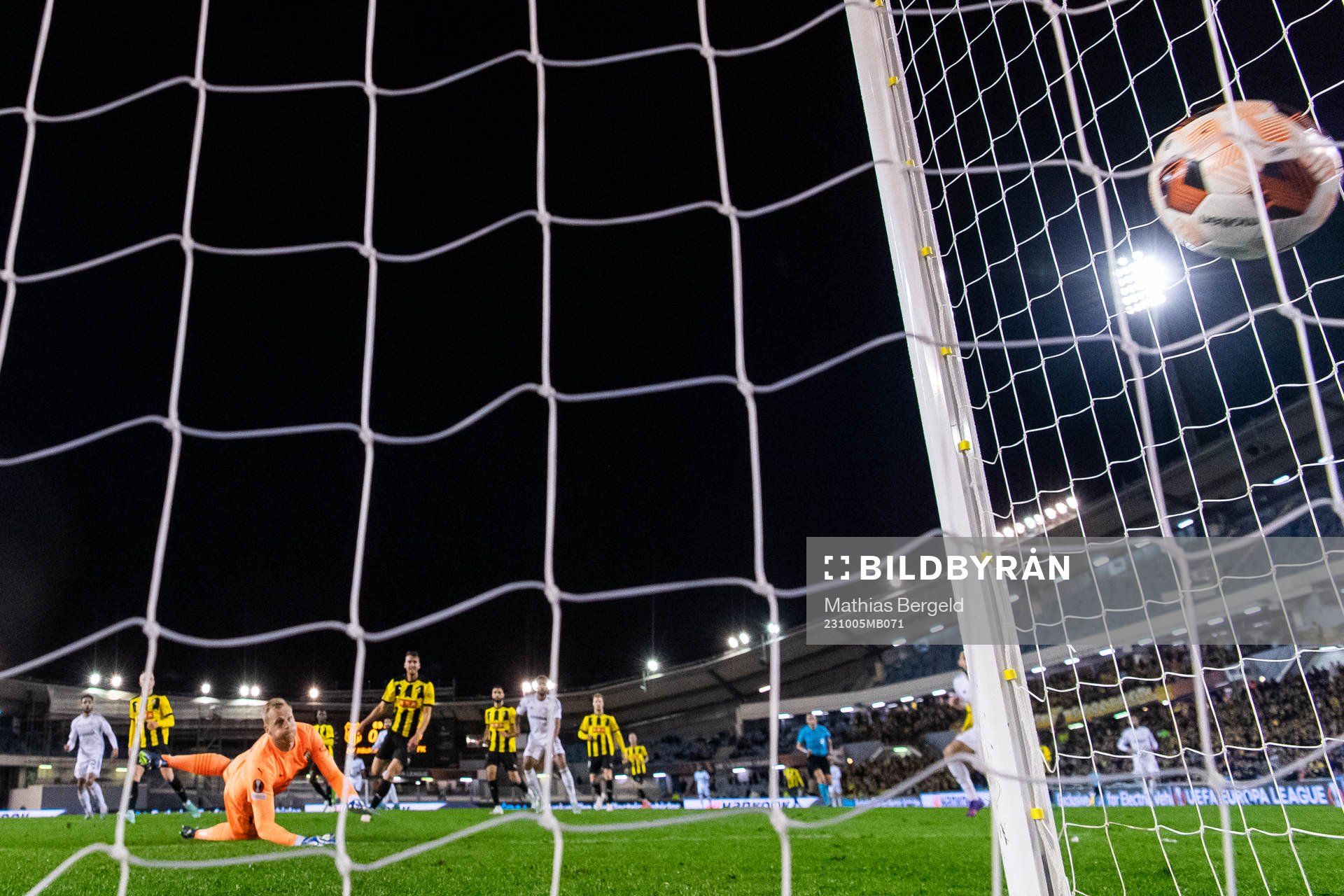 Juninho of Qarabag scores 0-1 behind goalkeeper Peter