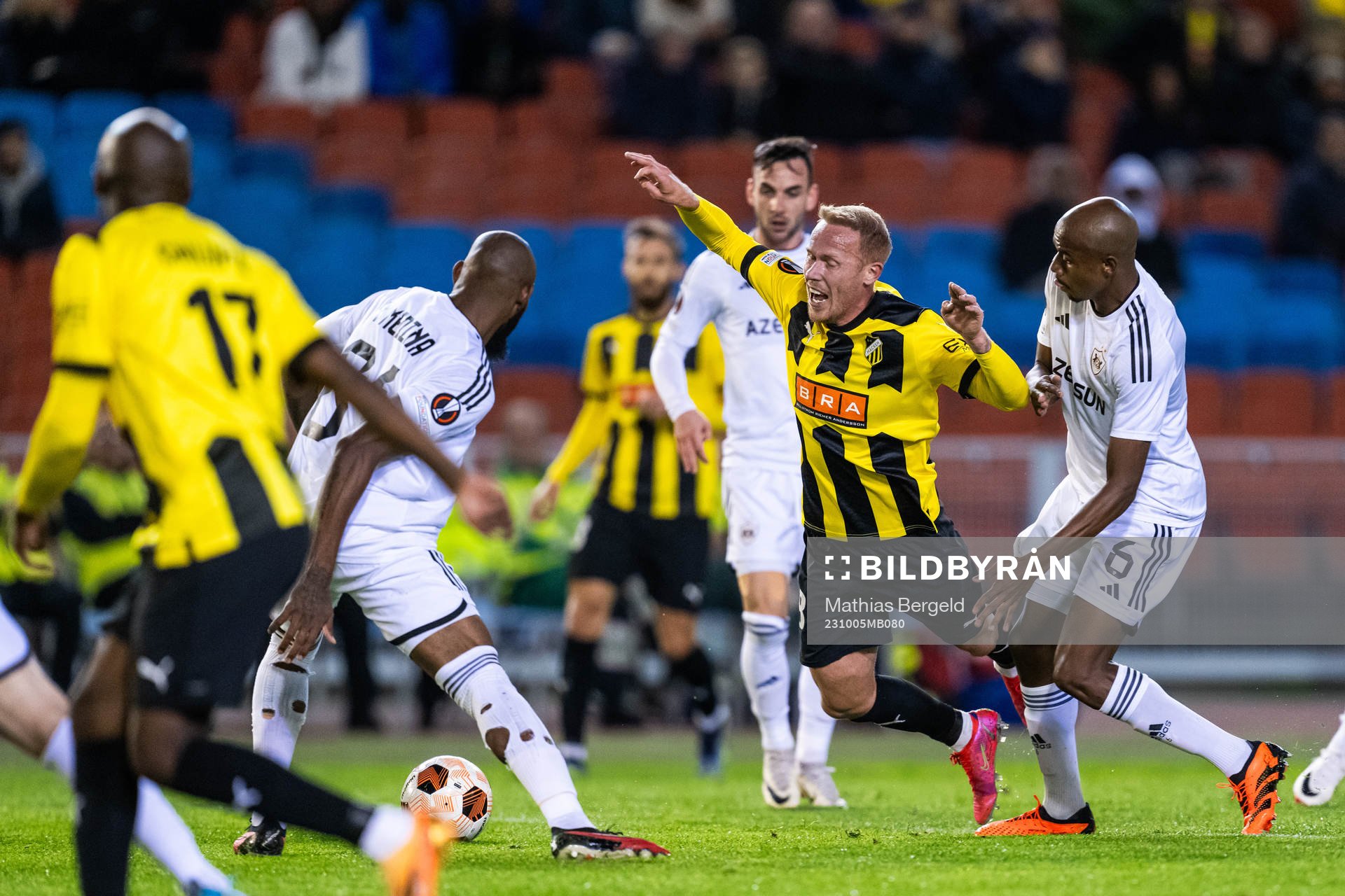 Mikkel Rygaard Jensen of Häcken falls in a duel with Julio