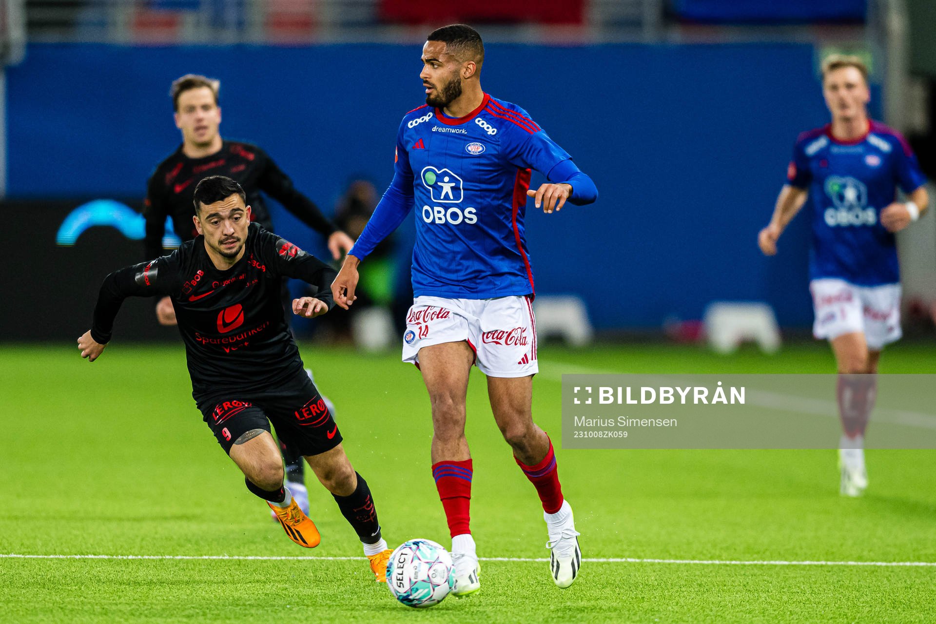 Niklas Castro of Brann and Aaron Kiil Olsen of Vålerenga