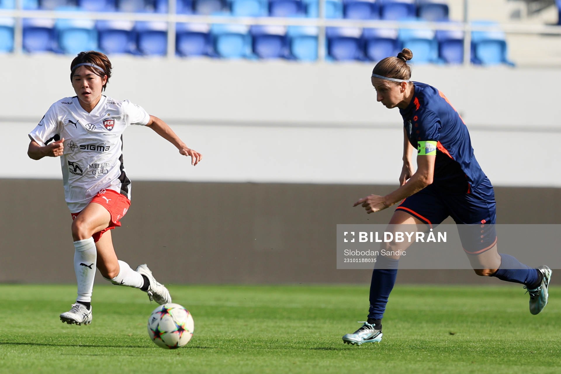 Mai Kadowaki of Rosengård and Violeta Slovic of Spartak