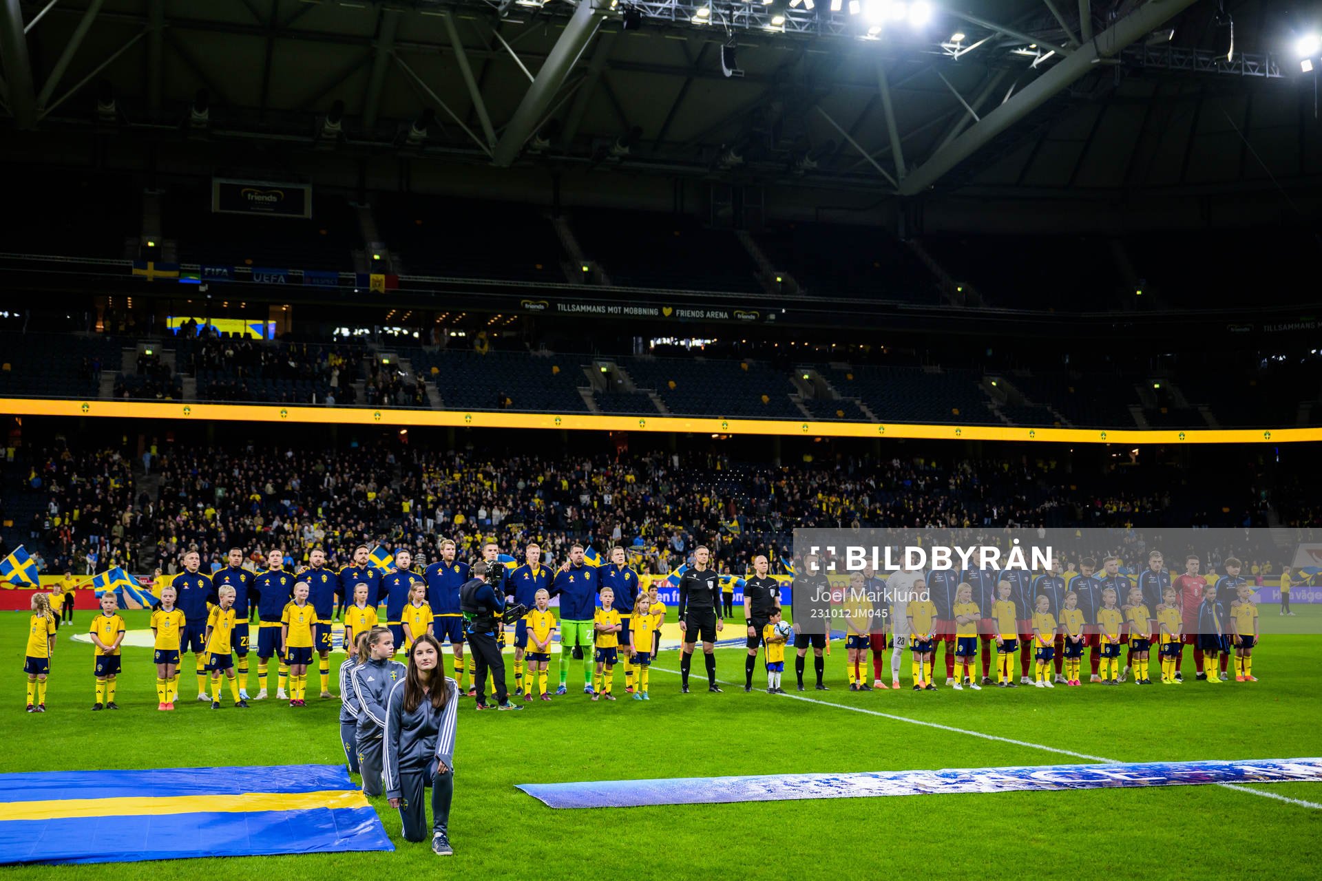 Players of Sweden and Moldova at lineup ahead the