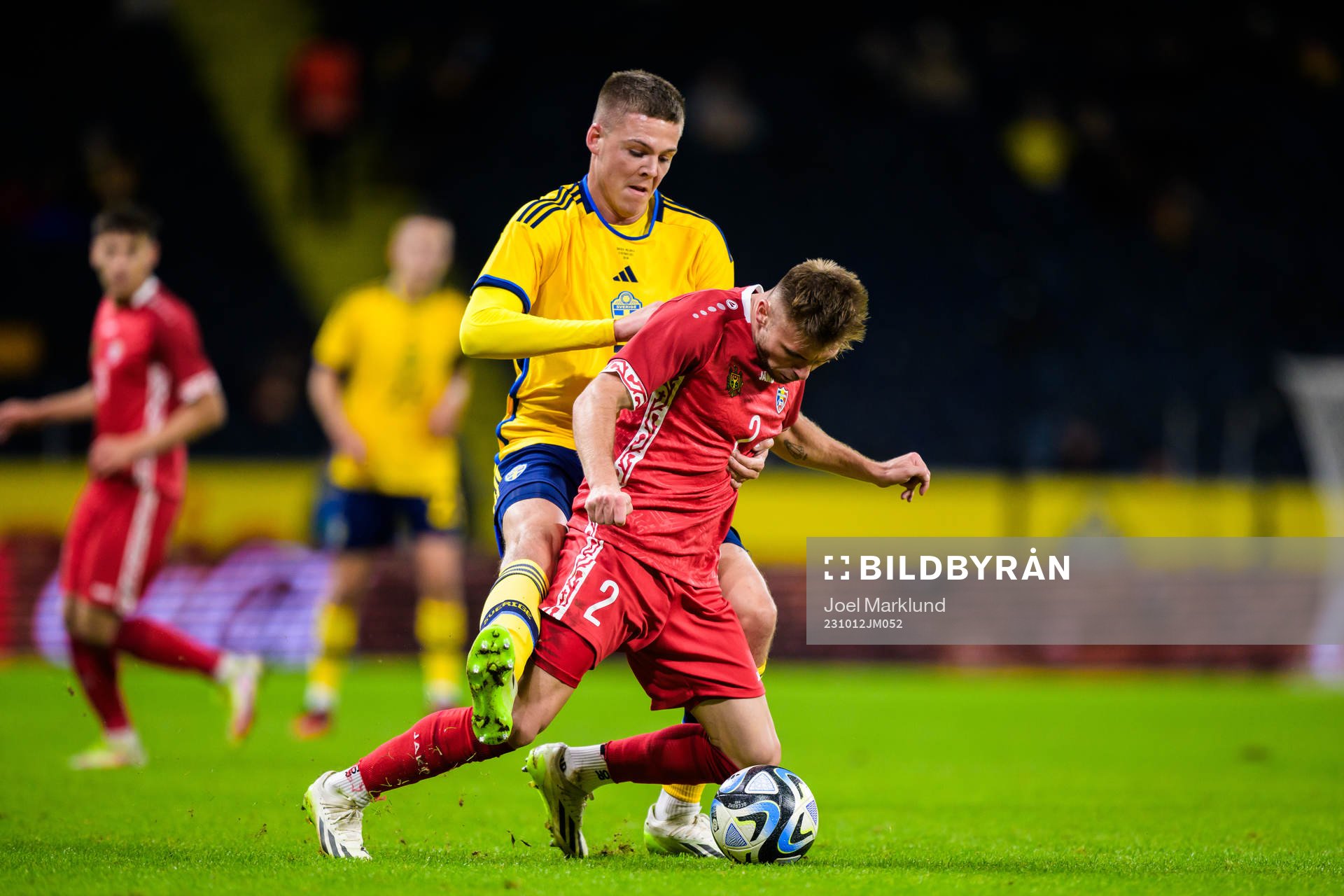 Emil Holm of Sweden and Oleg Reabciuc of Moldova during the international friendly football match between Sweden and Moldova on October 12, 2023 in Stockholm.