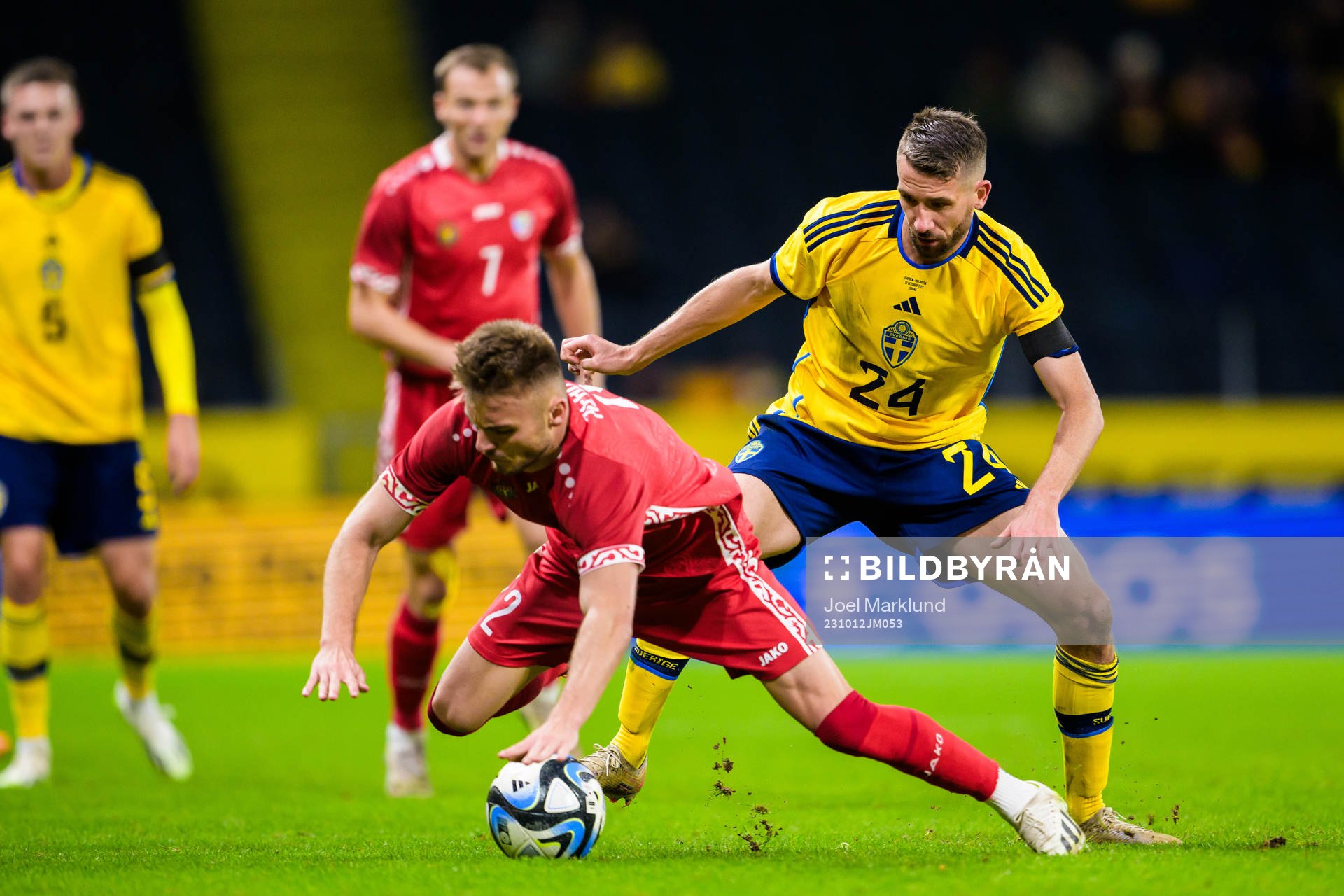 Oleg Reabciuc of Moldova and Marcus Rohdén of Sweden during the international friendly football match between Sweden and Moldova on October 12, 2023 in Stockholm.