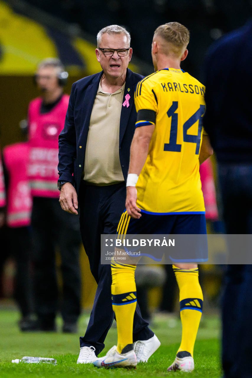 Head coach Janne Andersson and Jesper Karlsson of Sweden