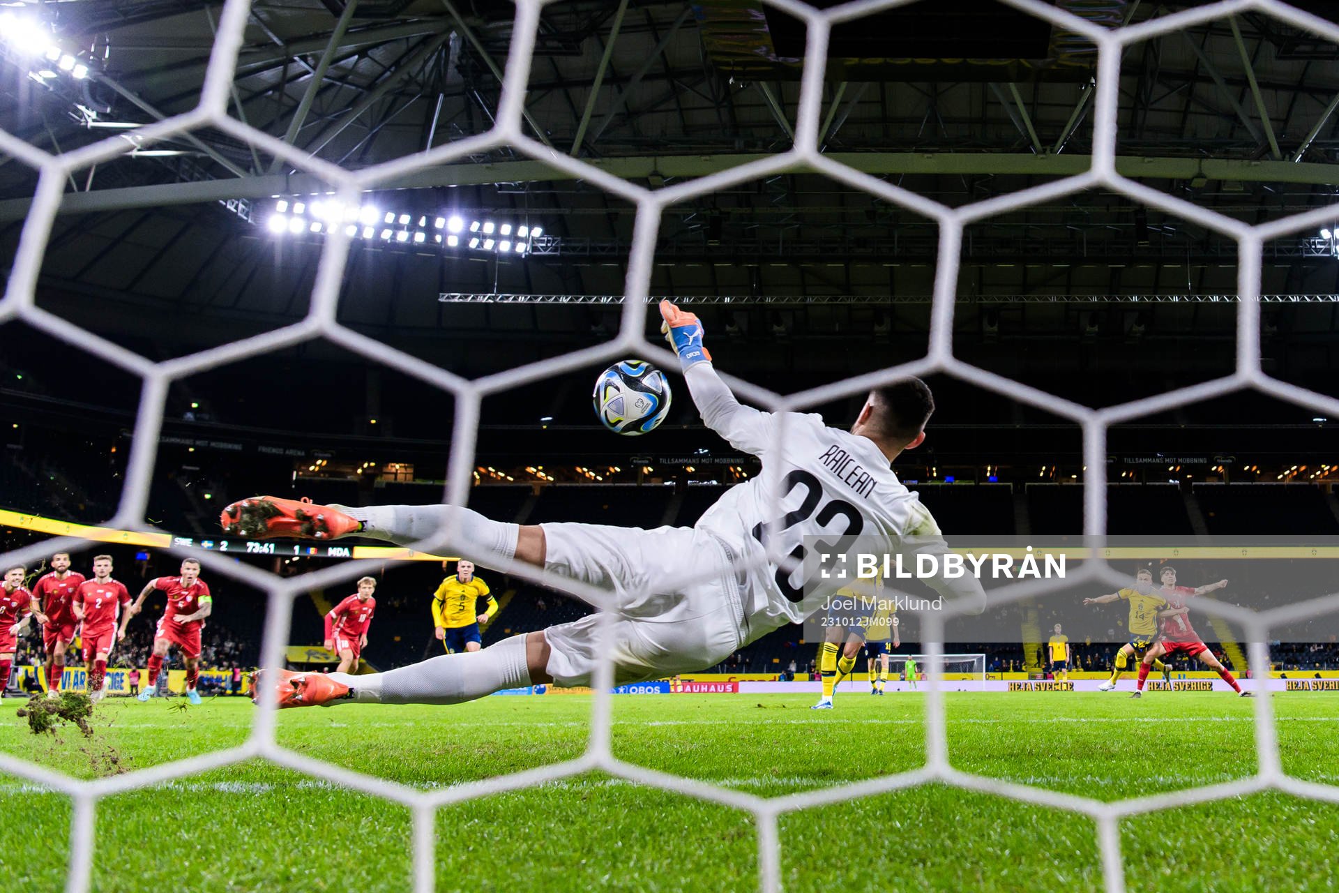 Goalkeeper Dorian Railean of Moldova saves a penalty by